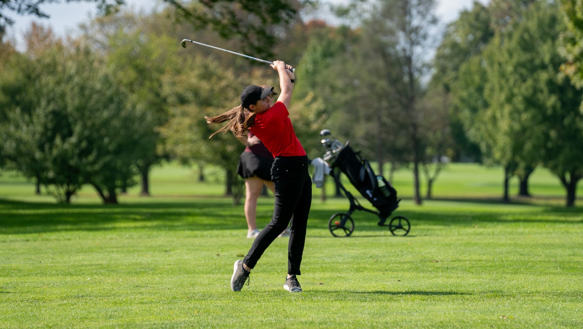 Maggie Byers in the middle of the fairway at the Dickinson College Fall Invite on 10-7-24