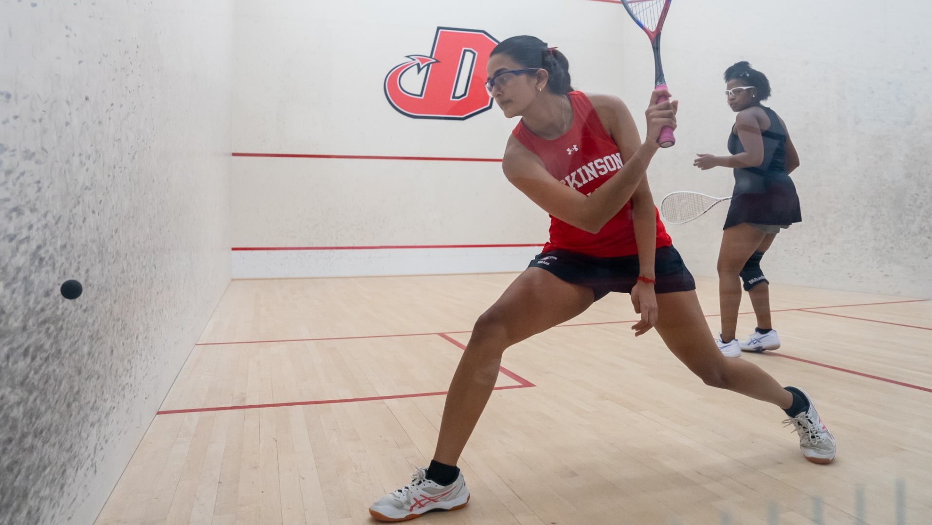 Thea Hegde getting ready for a shot against Chatham University on 11-15-24