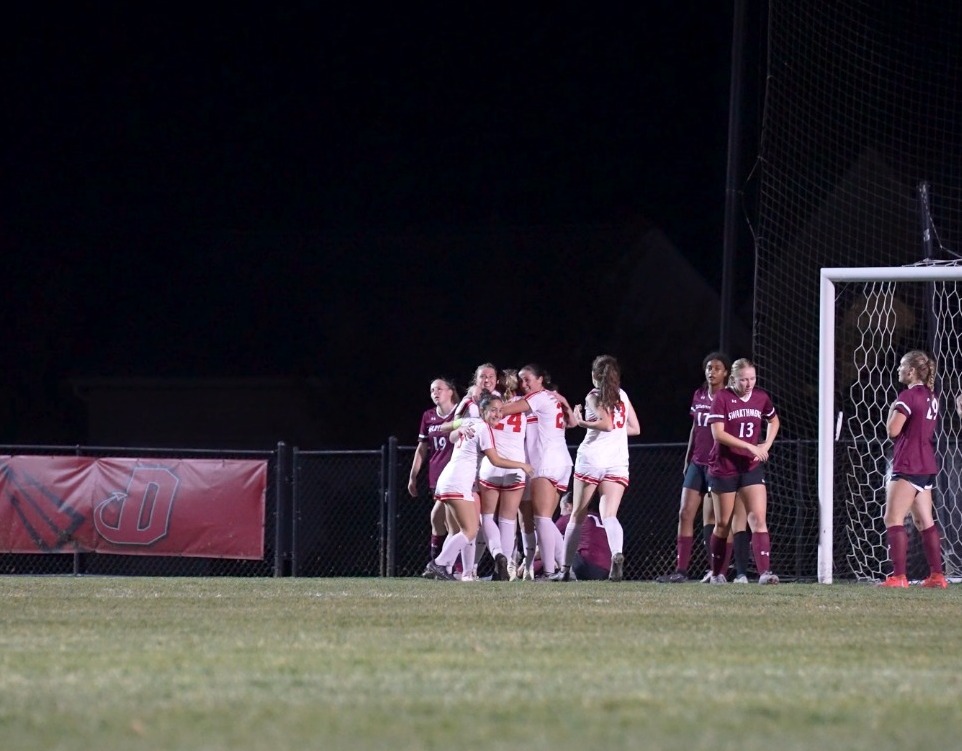 Team celebration for women's soccer after beating Swarthmore College in CC Tournament on 11-5-24