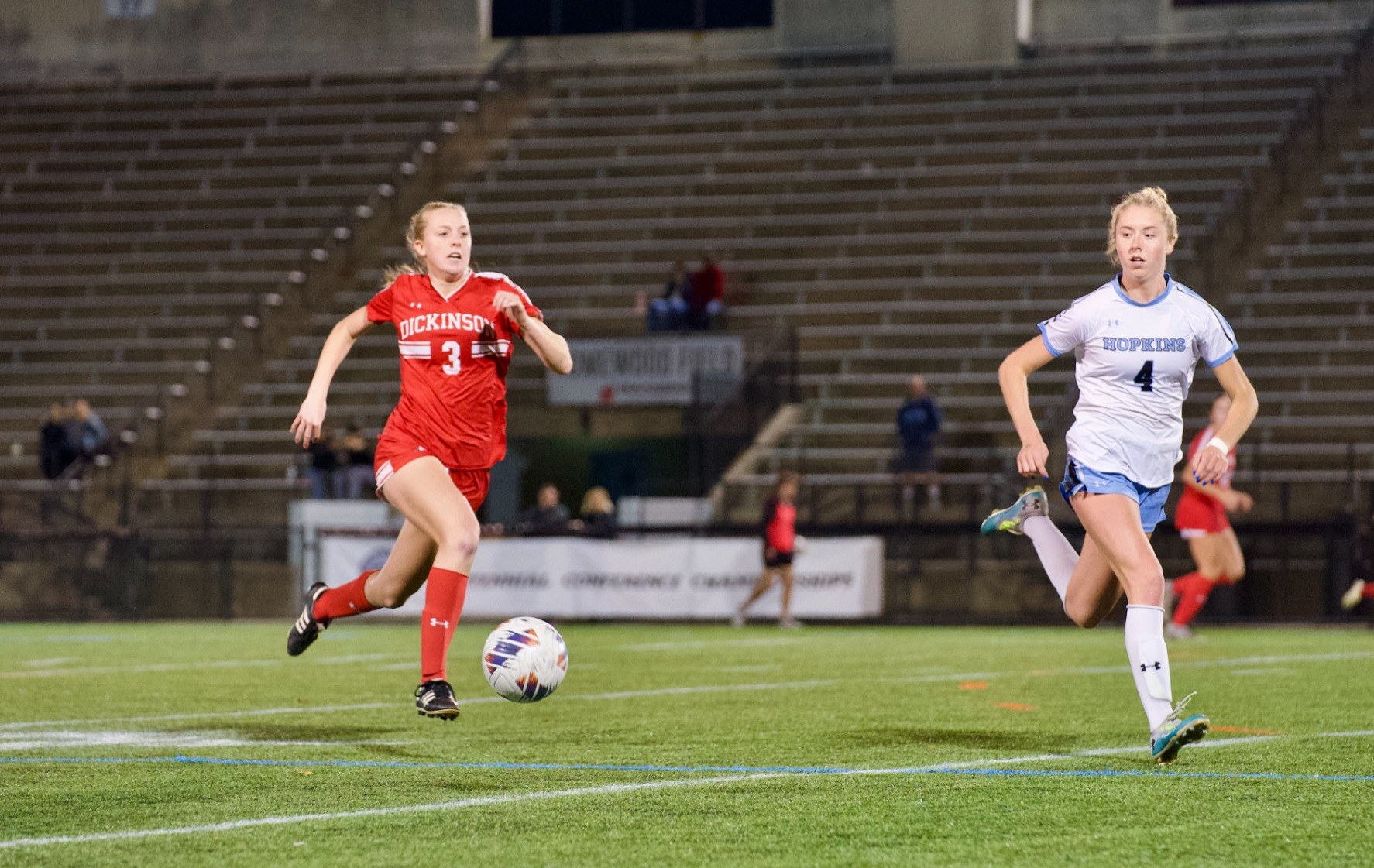 Lauren Ervin carrying the ball forward against Johns Hopkins on 11-8-24