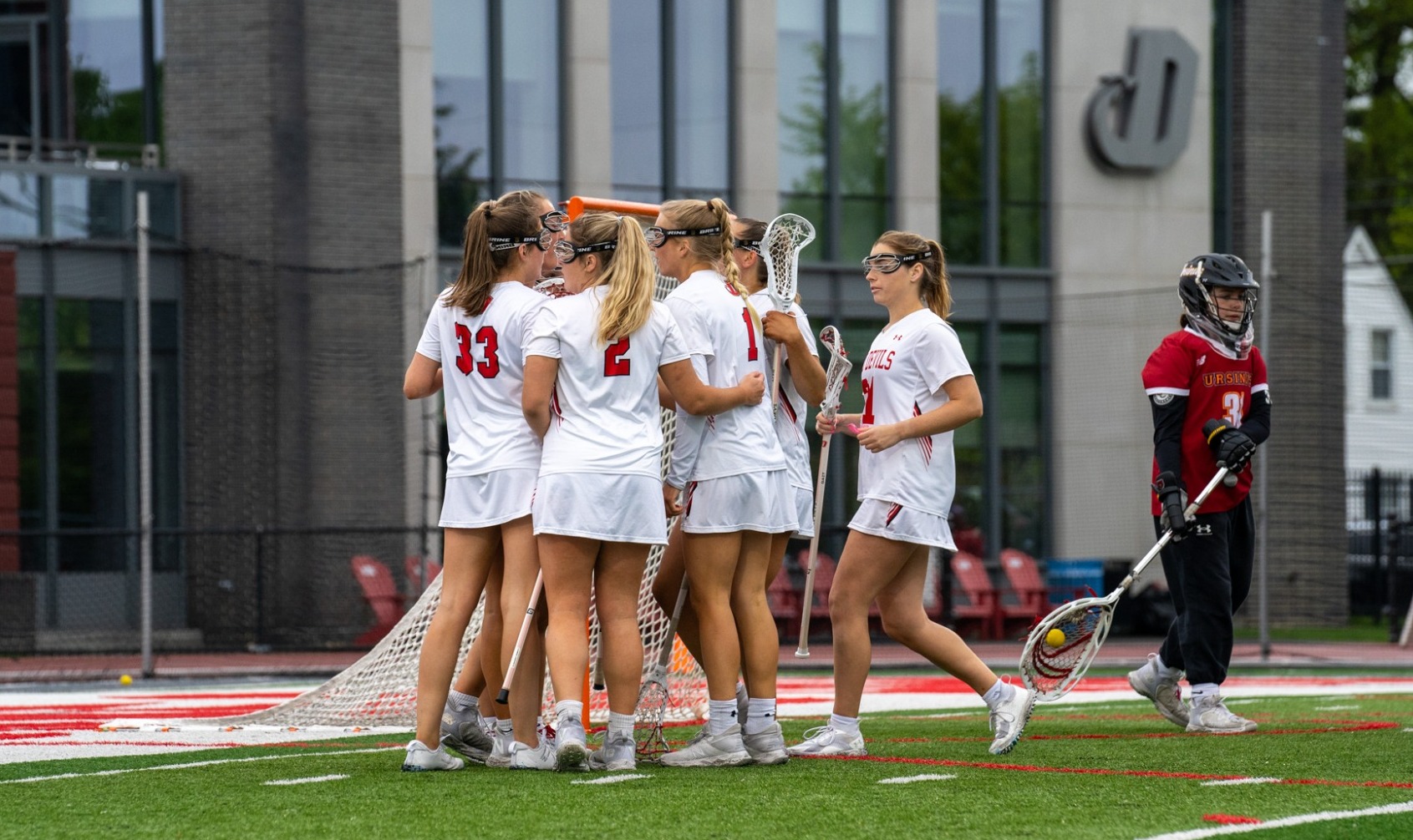 Group goal celebration shot against Ursinus College on 4-27-24