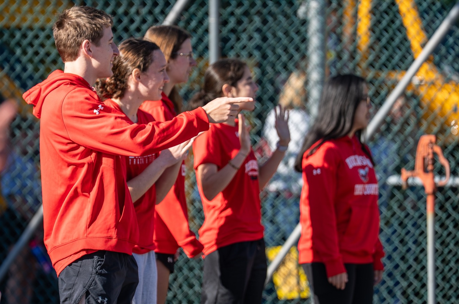 Dickinson athletes welcoming the Special Olympics athletes to Biddle Field on 10-2-25