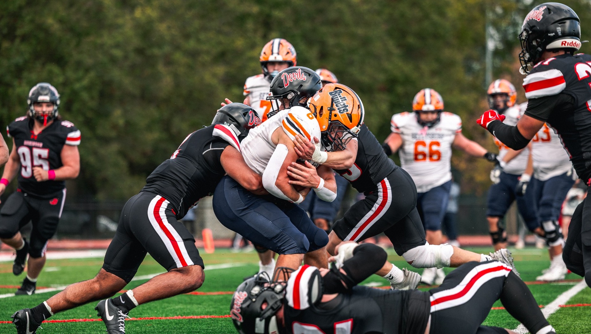 Dickinson football making a tackle against Gettysburg College on 10-11-25