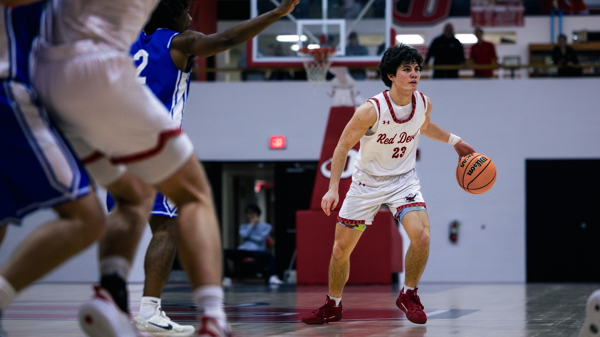 Jacob Pichay dribbling the ball against Washington and Lee University on 11-22-25