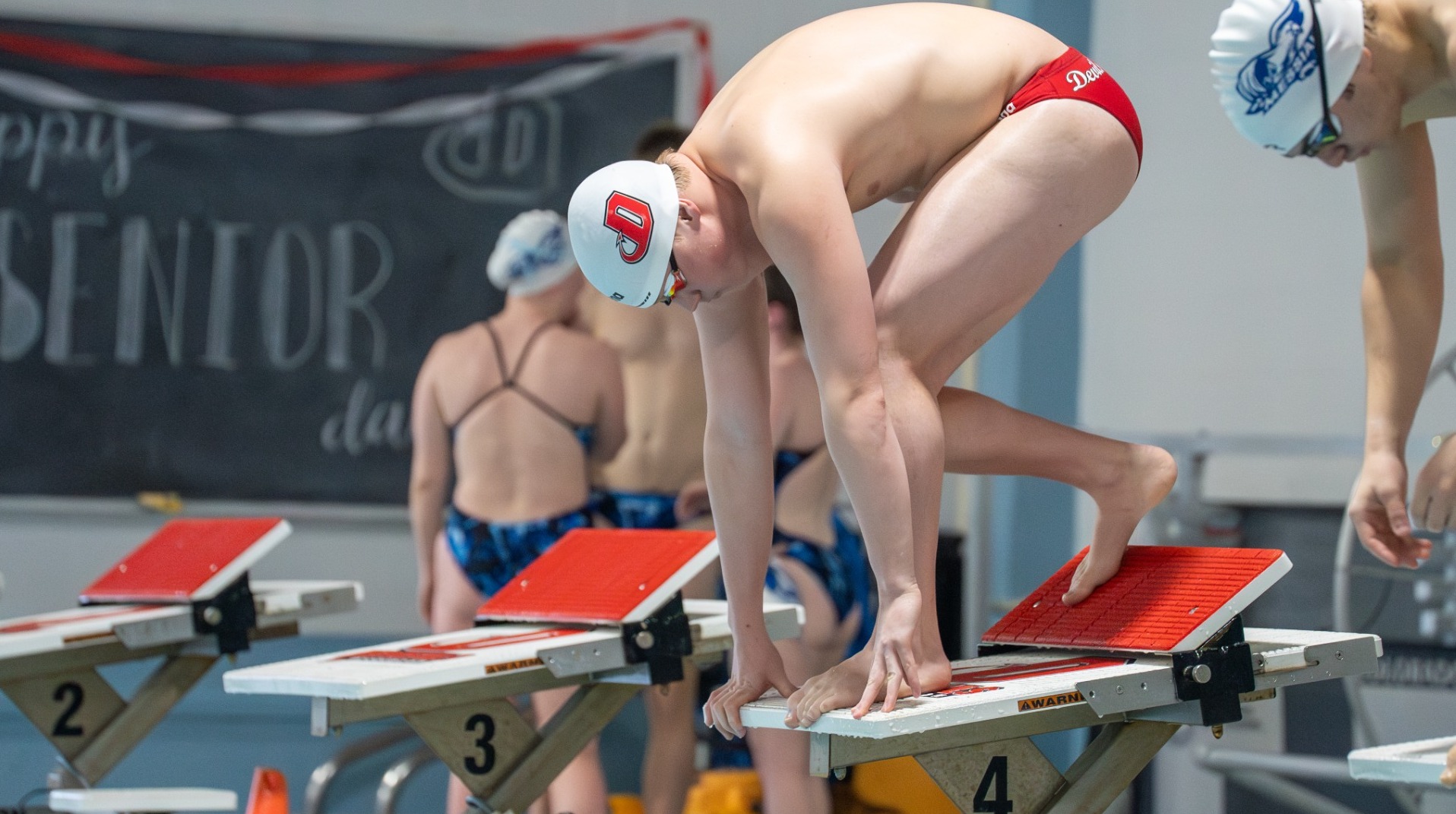 Men's Swimmer waiting at the starting block against Messiah University 1-18-25