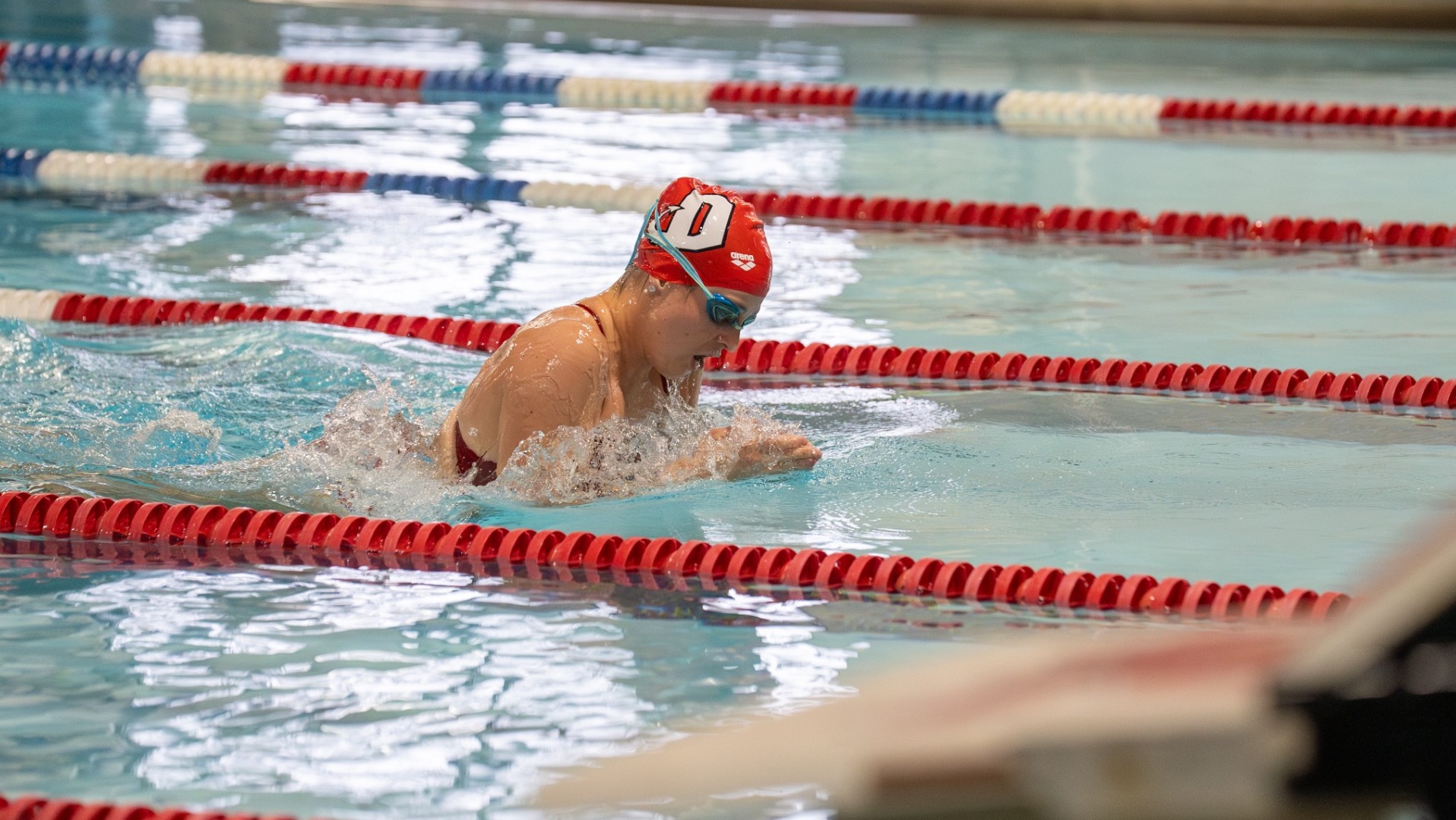 Women's swimmer during the breaststroke against Messiah University on 1-18-25
