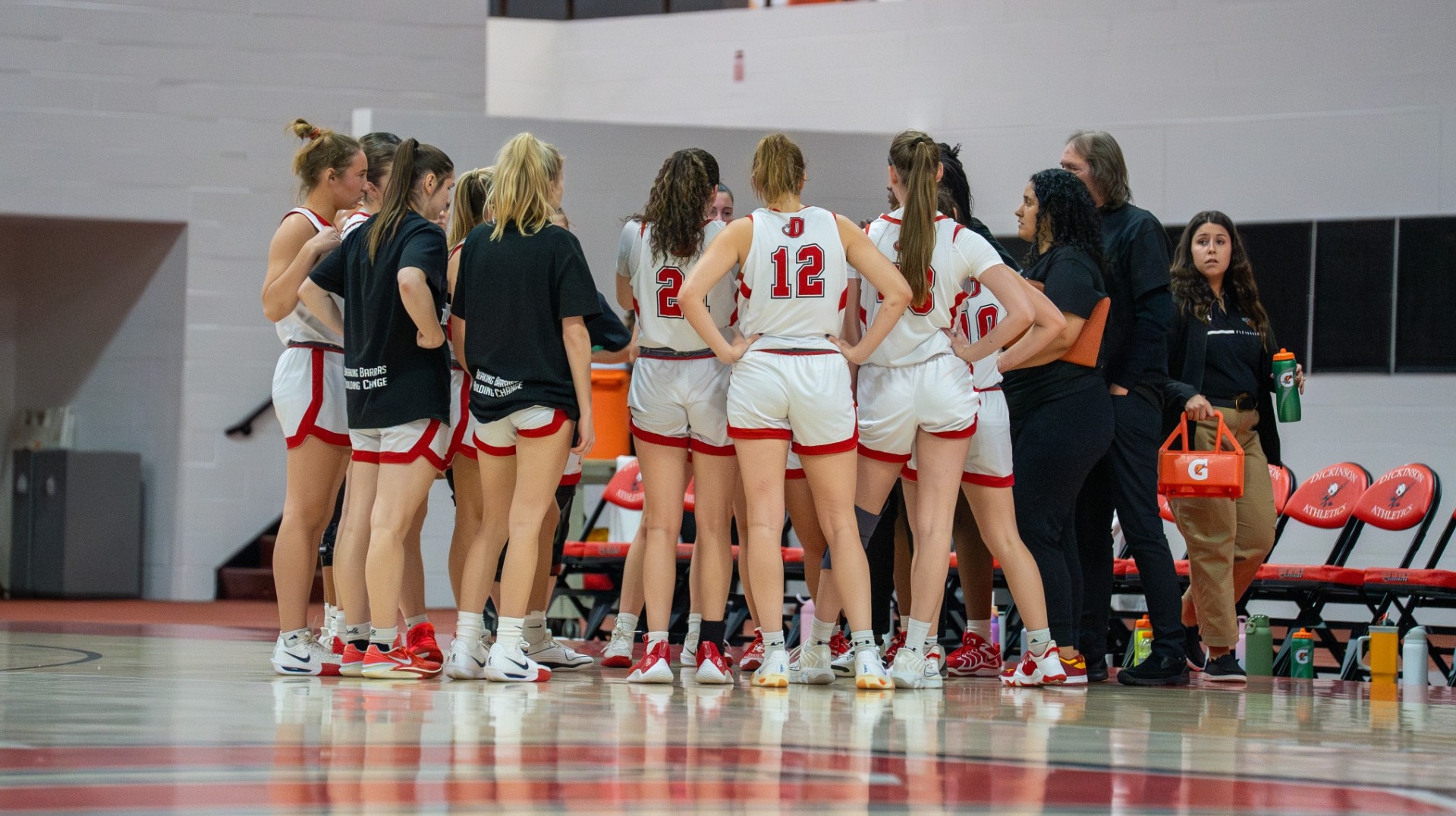Dickinson women's basketball team huddle against Gettysburg College during 2024-25 season
