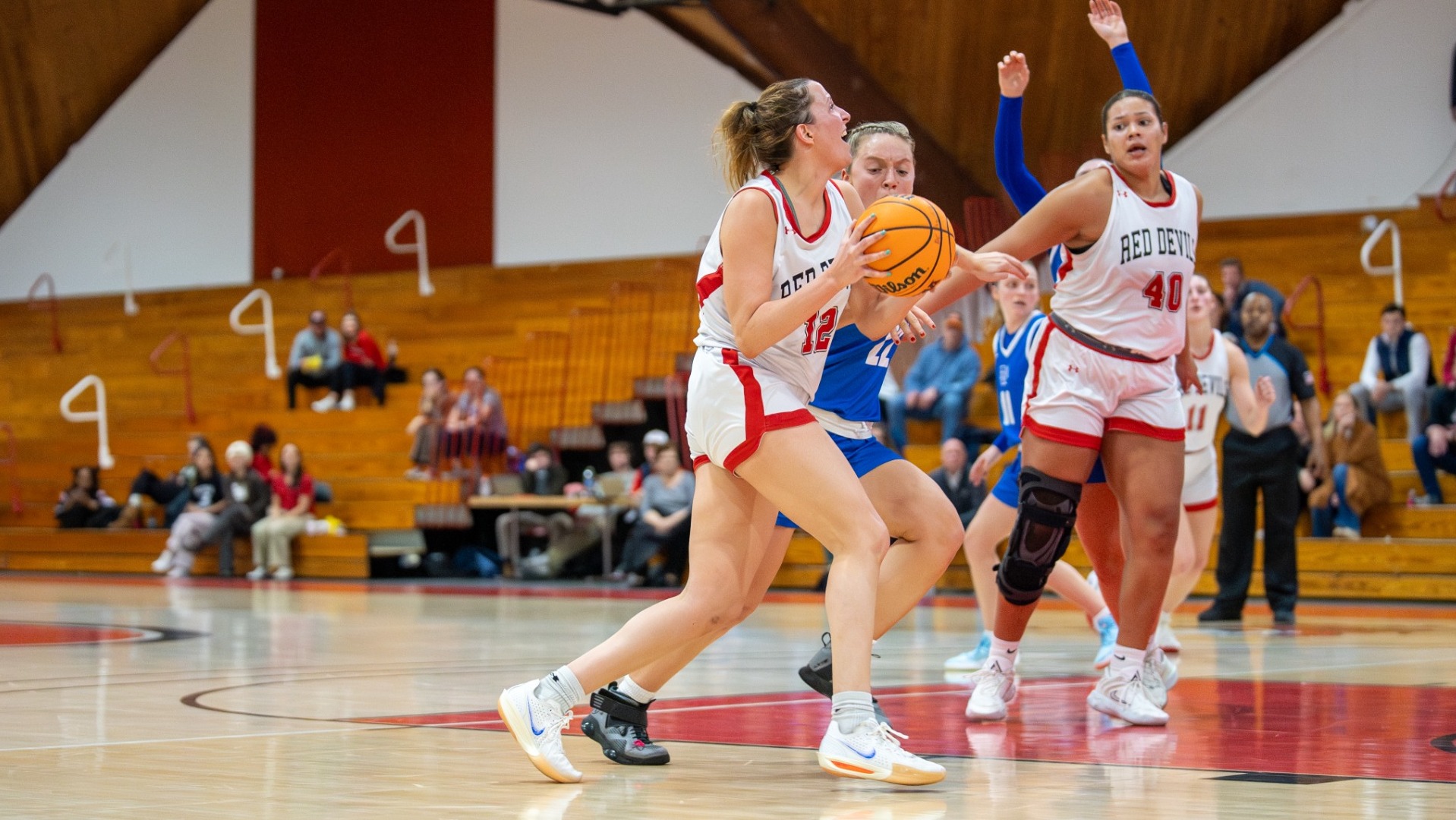Clair Marion driving down the lane against Franklin and Marshall College on 2-19-25