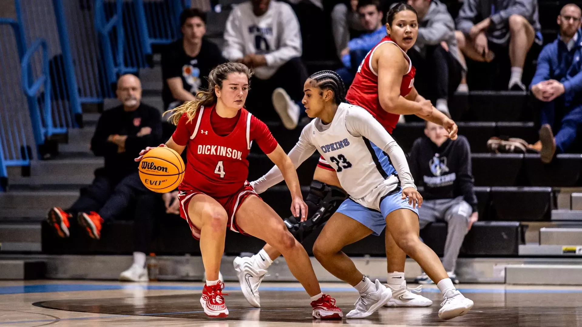 Caitlin Blackman on the back-off dribble against Johns Hopkins in CC Semifinal on 2-28-25