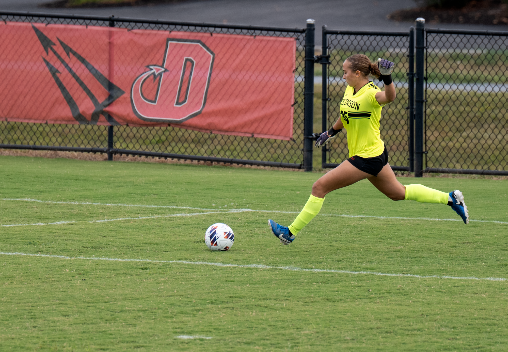 Pico Gray kicks the ball out of the goal box