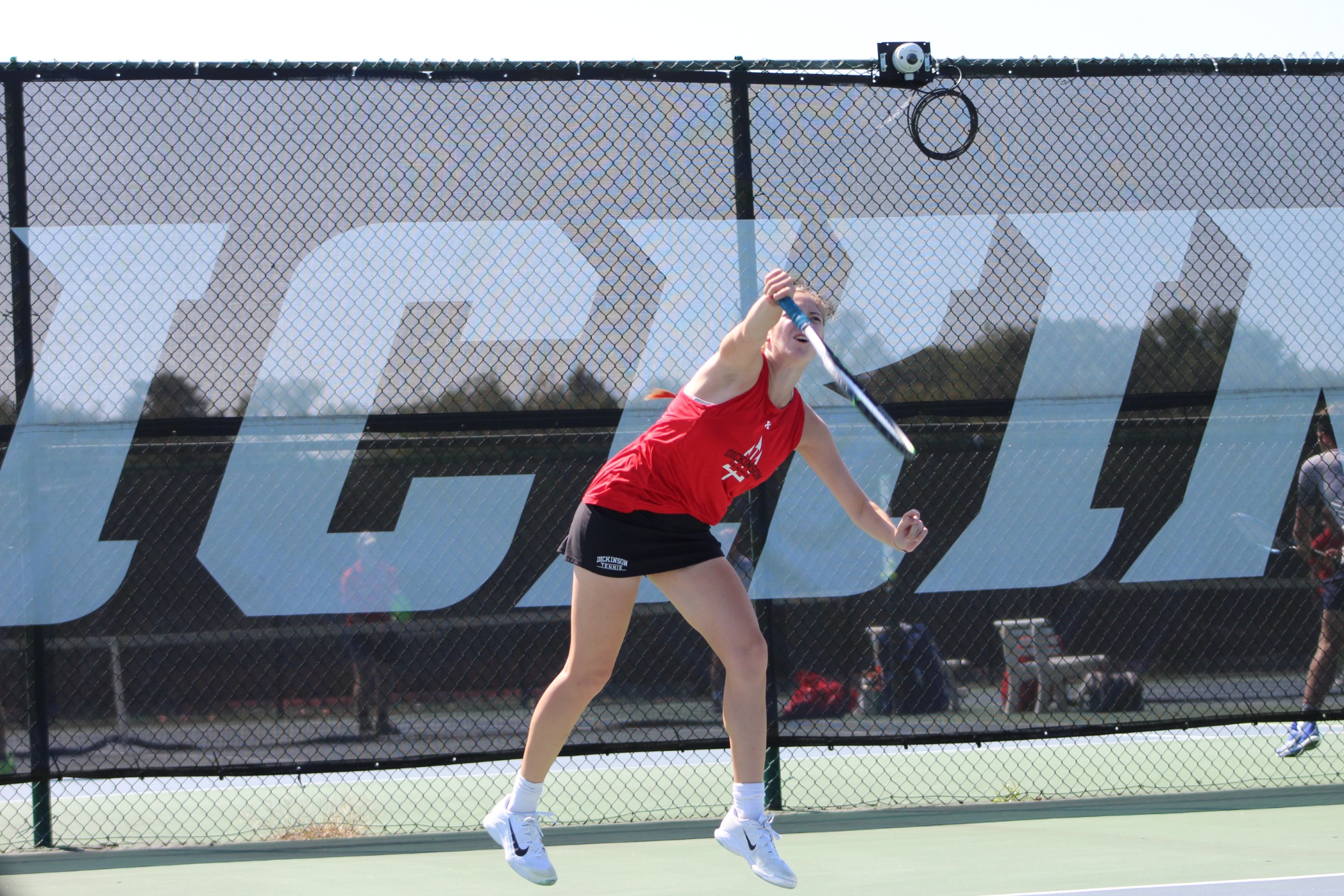 Dickinson Women Tennis ready to serve.