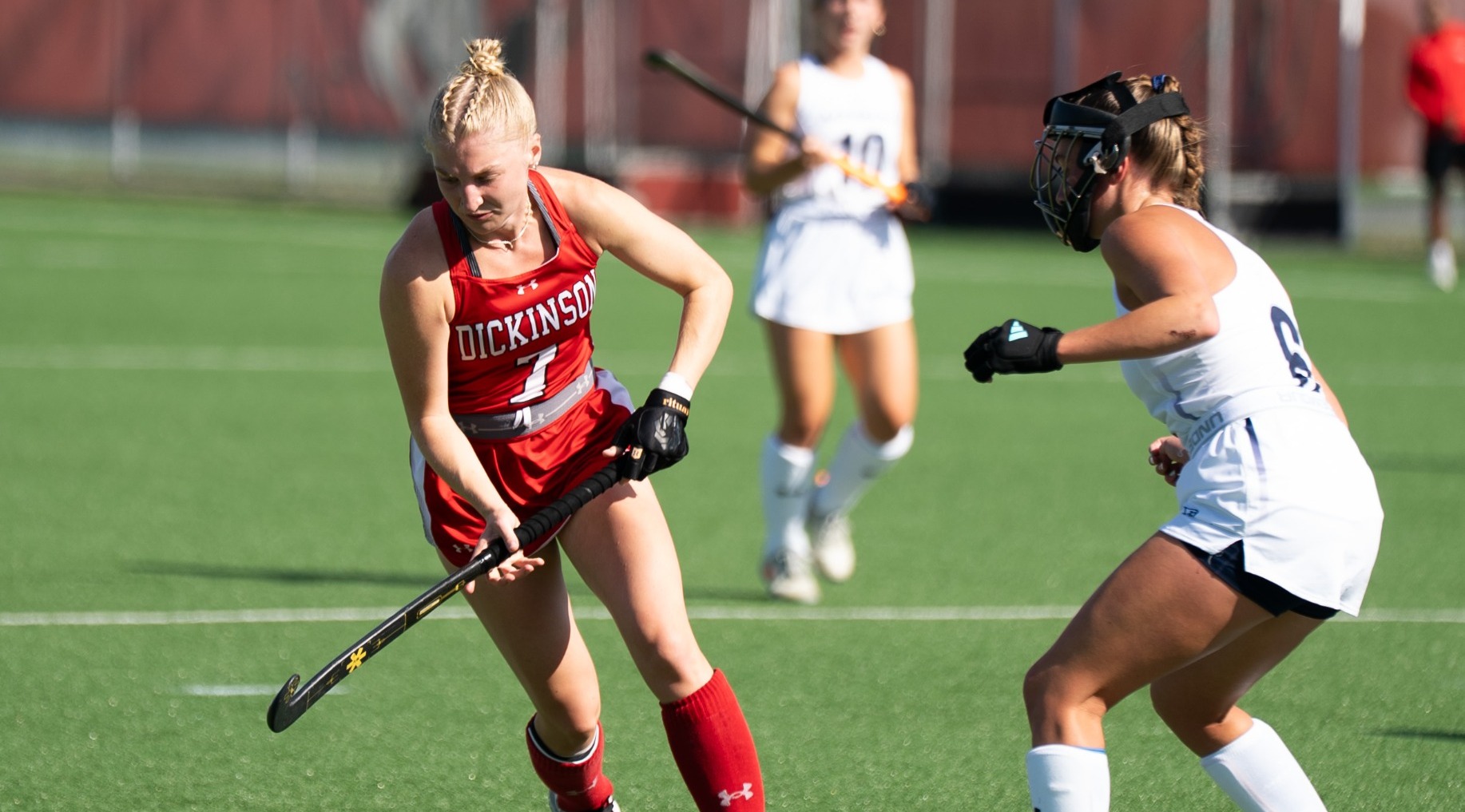 Nicole Uebele carrying the ball down the field against Messiah University 8-29-25