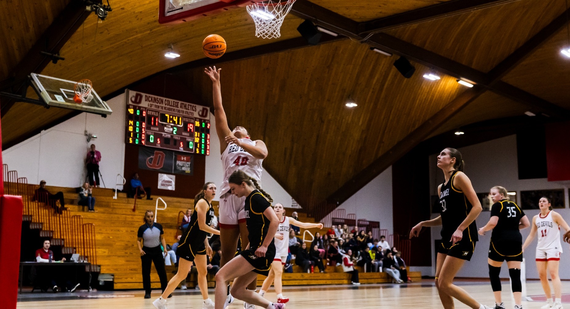 Mia Chapman going up for a layup against McDaniel College on 1-14-26