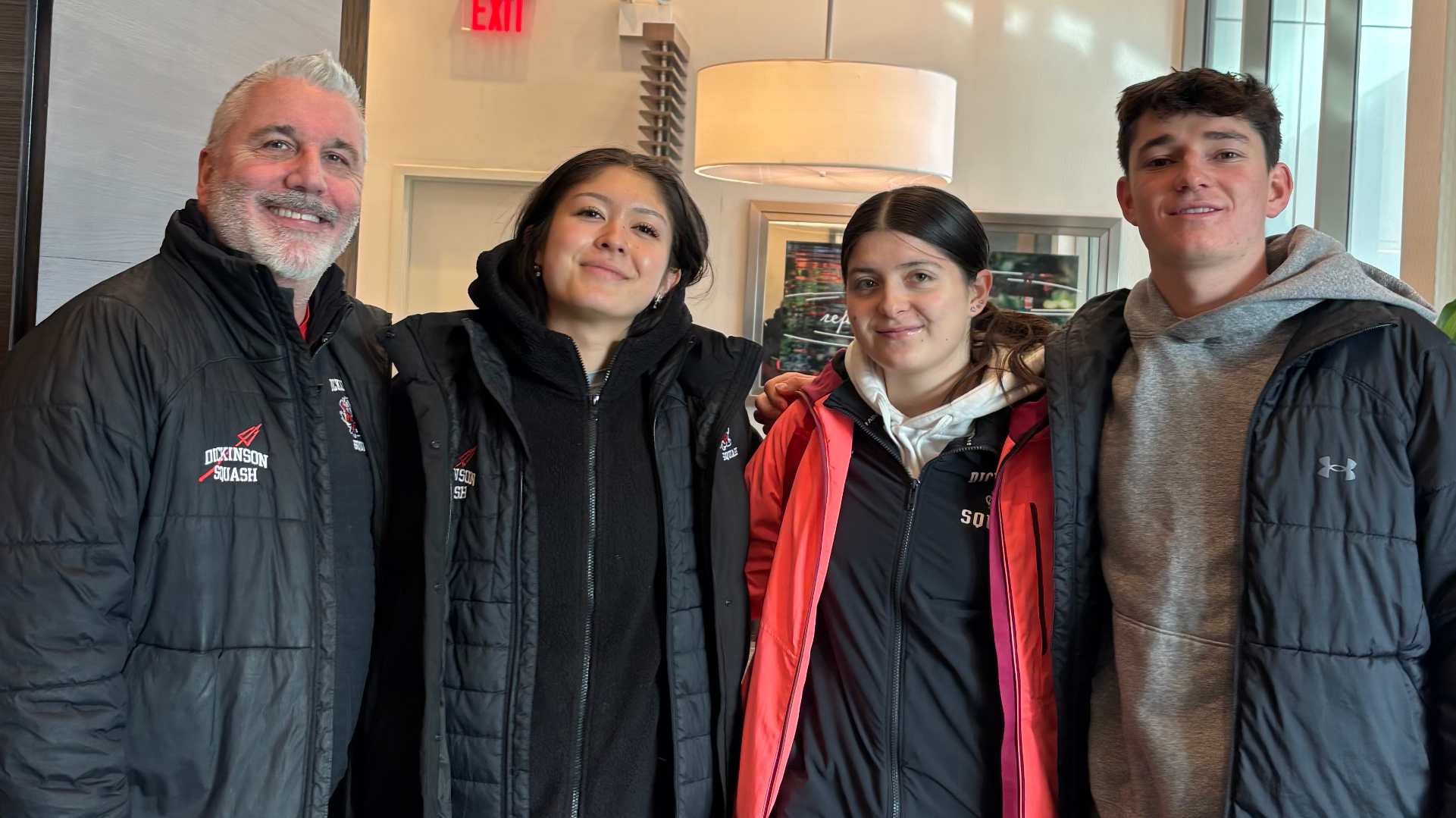 Squash trio at CSA Individual Championships with Coach Glanfield on 1-24-26