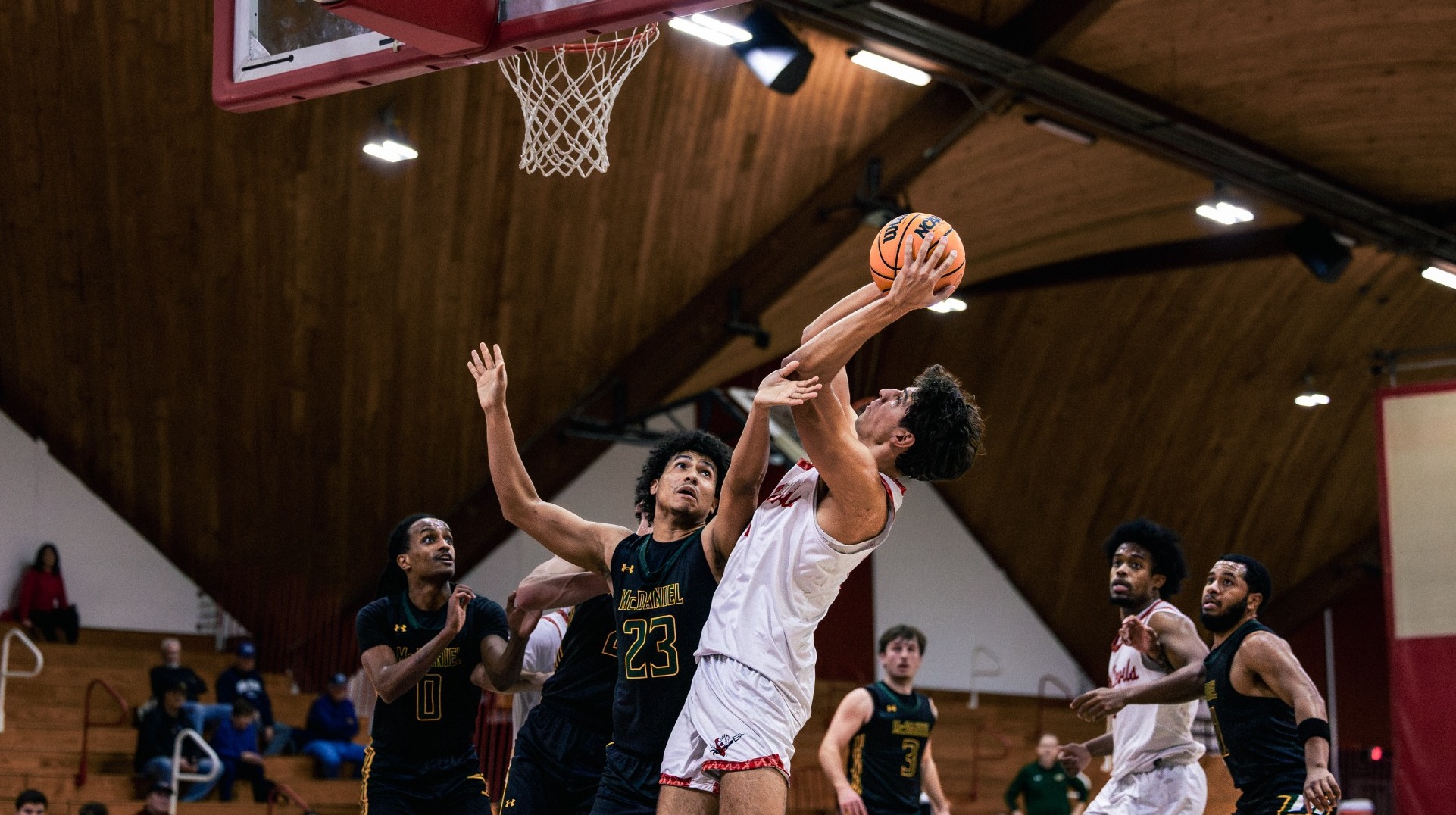 Juan Ruiz attempting a fadeaway shot against McDaniel College on 1-14-26