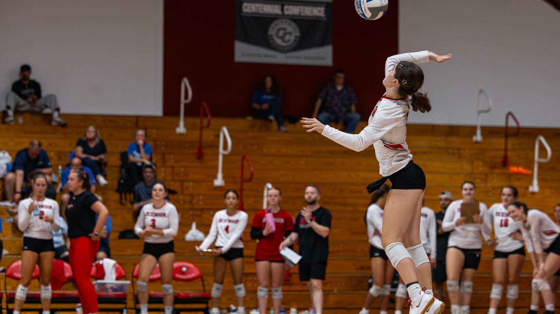 Amanda Palo going for a serve against Misericordia University on 9-12-26