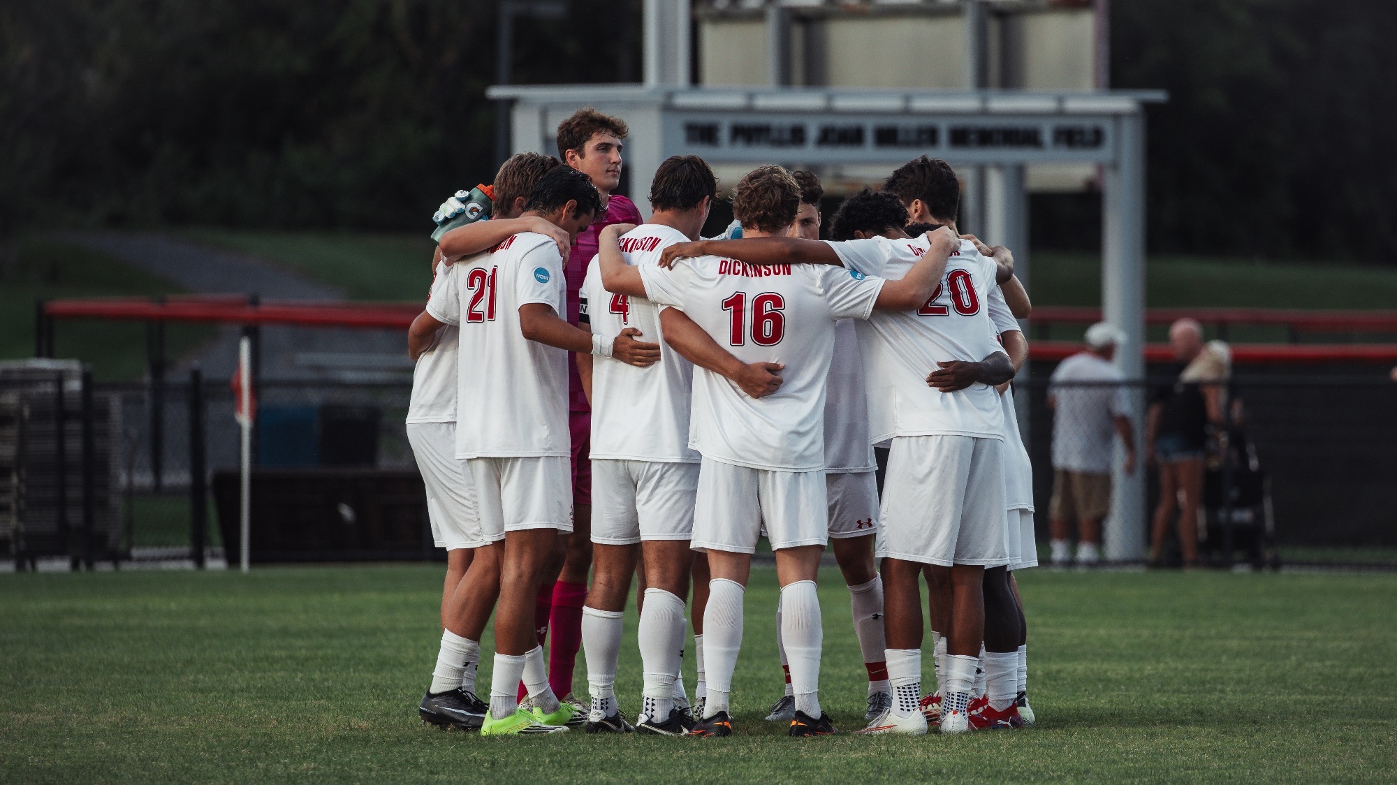 Dickinson Men's Soccer team huddle before match against Rowan