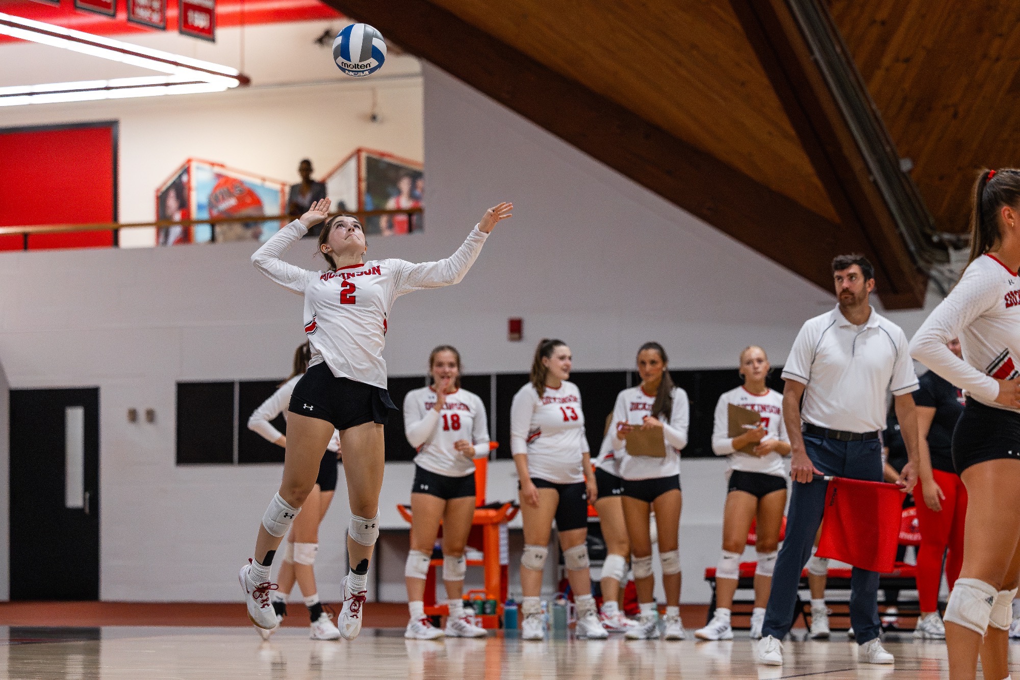 Amanda Palo serves against Catholic