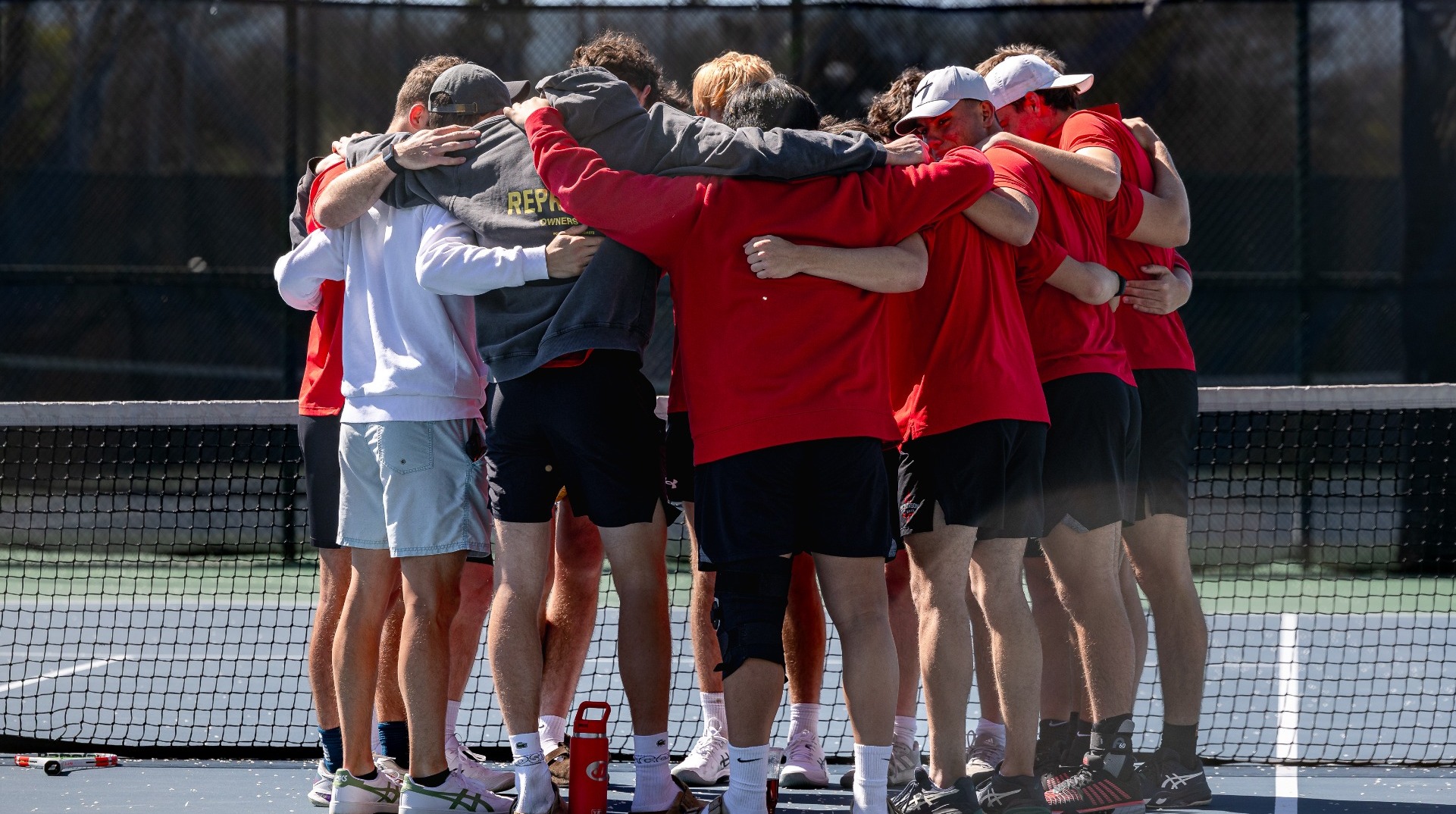 Men's Tennis team huddle from the 2026 season