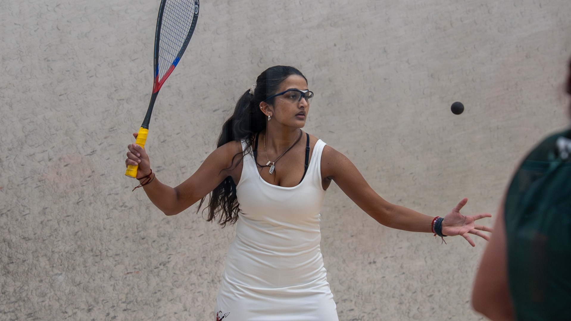 Thea Hegde going for a forehand shot against William Smith on 1-30-26