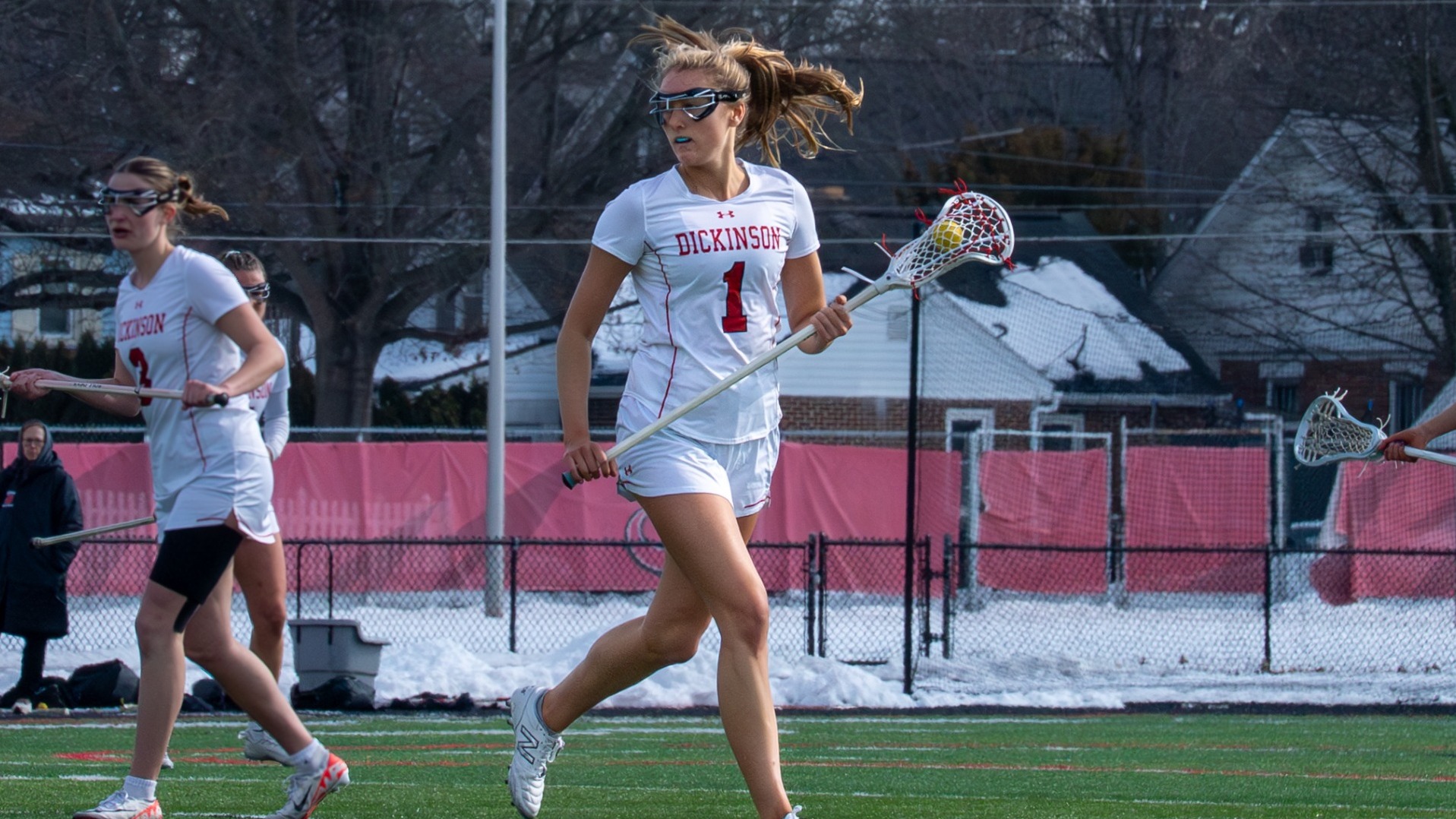 Eva Gardner running down the field against Lebanon Valley College on 2-14-26