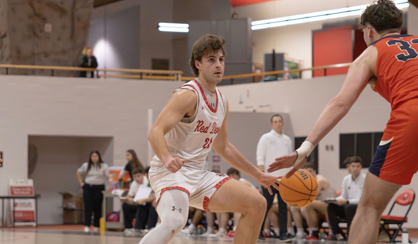Ryan Leskauskas dribbling the ball in the paint during the 2026 season 