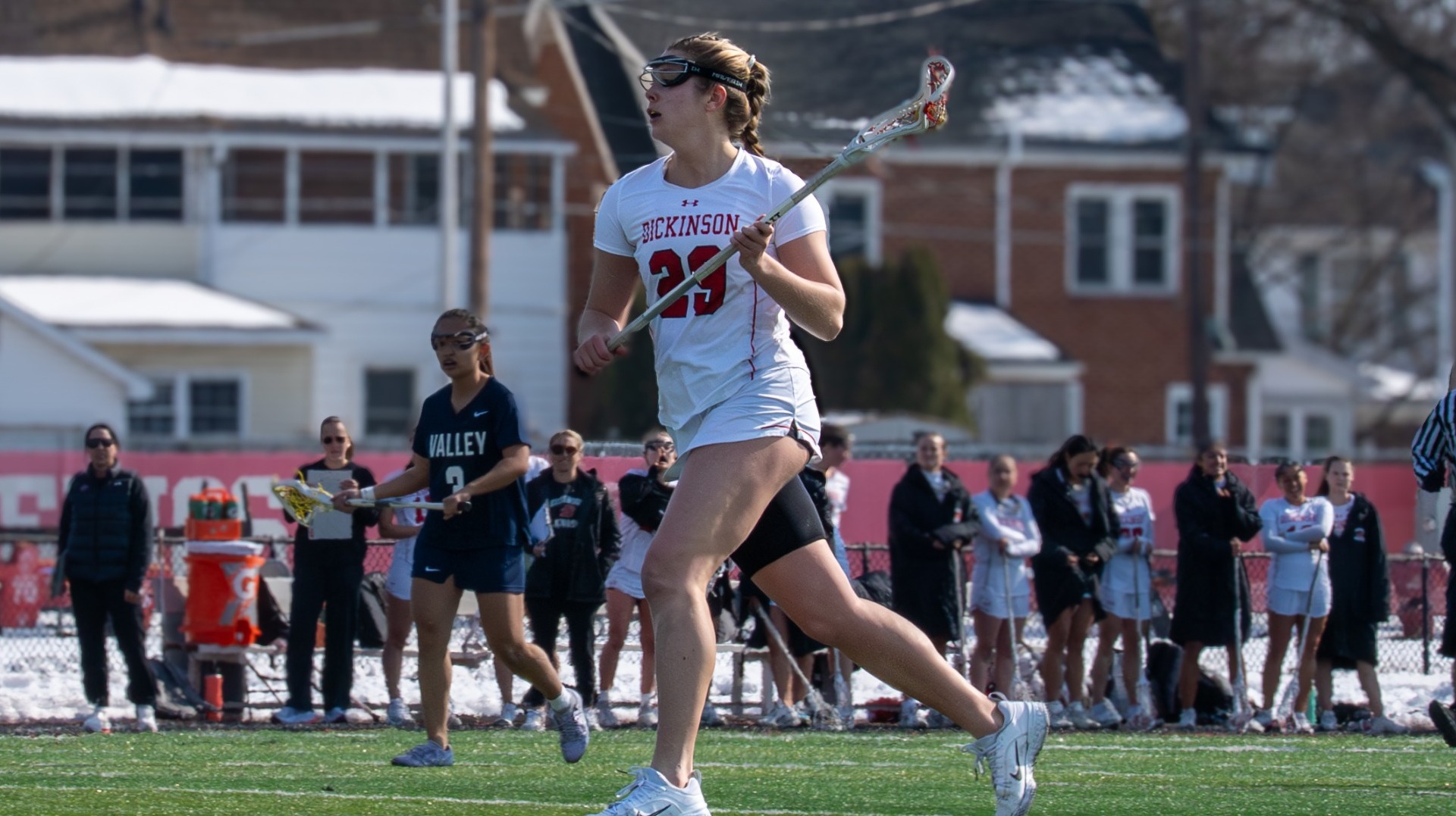 Quinn Foa running the ball forward against Lebanon Valley College on 2-14-26