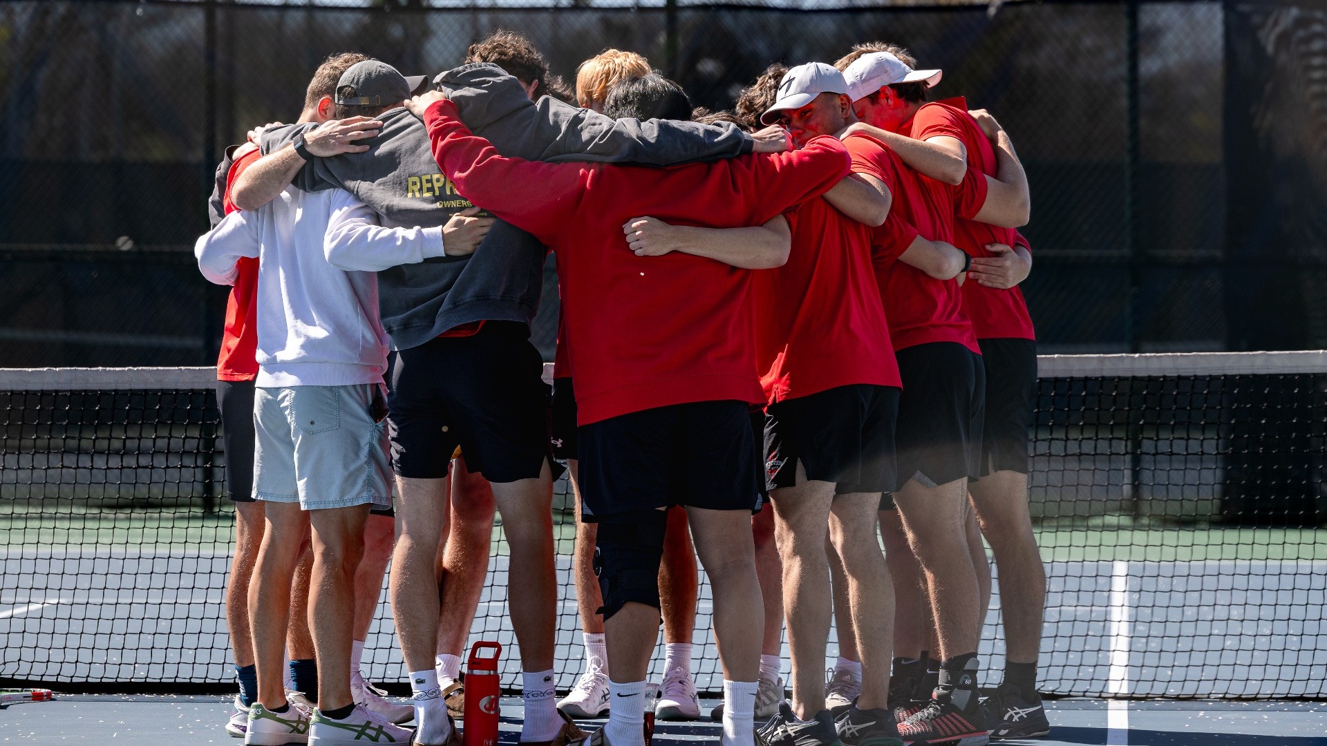 Men's tennis team huddle shot against McDaniel College on April 11th, 2026