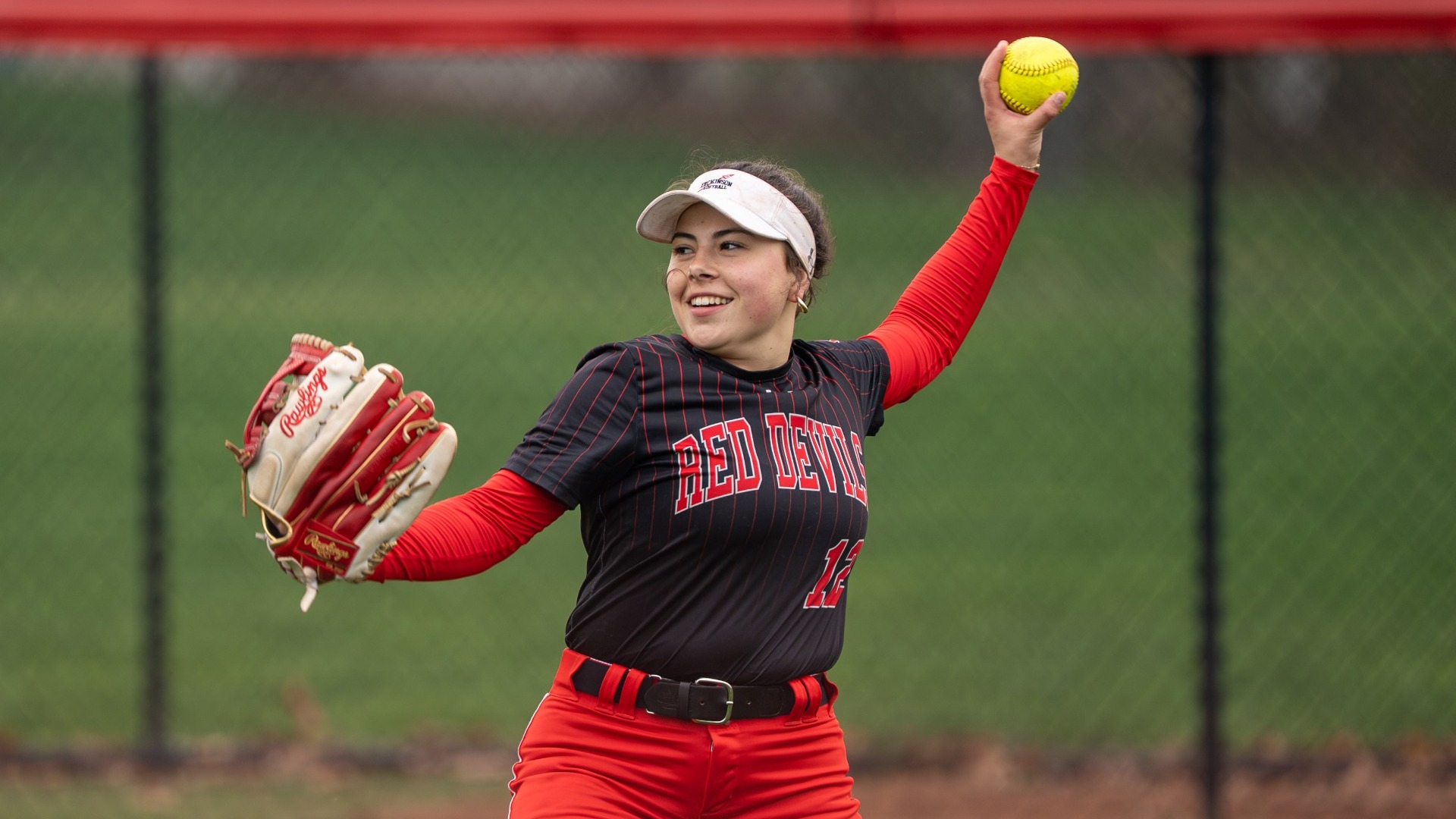 Aubrey Gilbert about to throw the ball in against Juniata College on 4-2-26