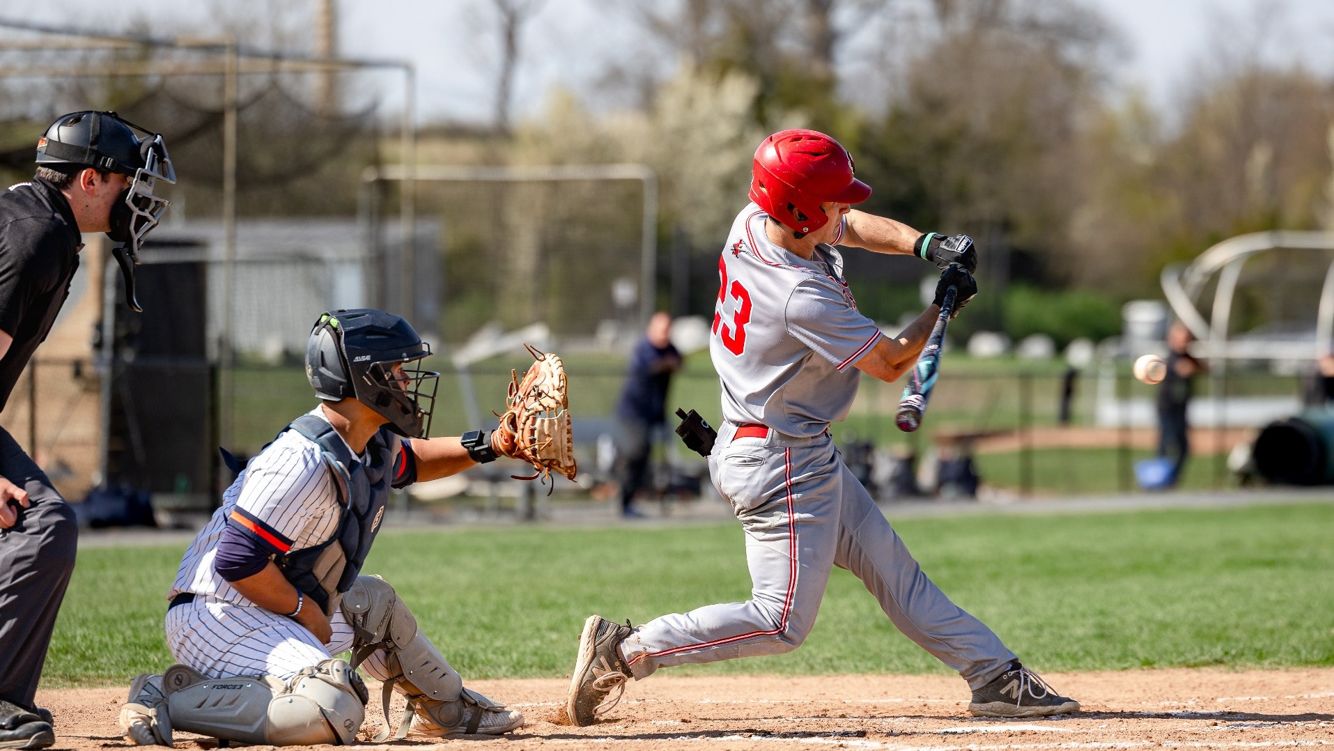 Luke Gartland swinging at a pitch against Gettysburg College during the 2026 season