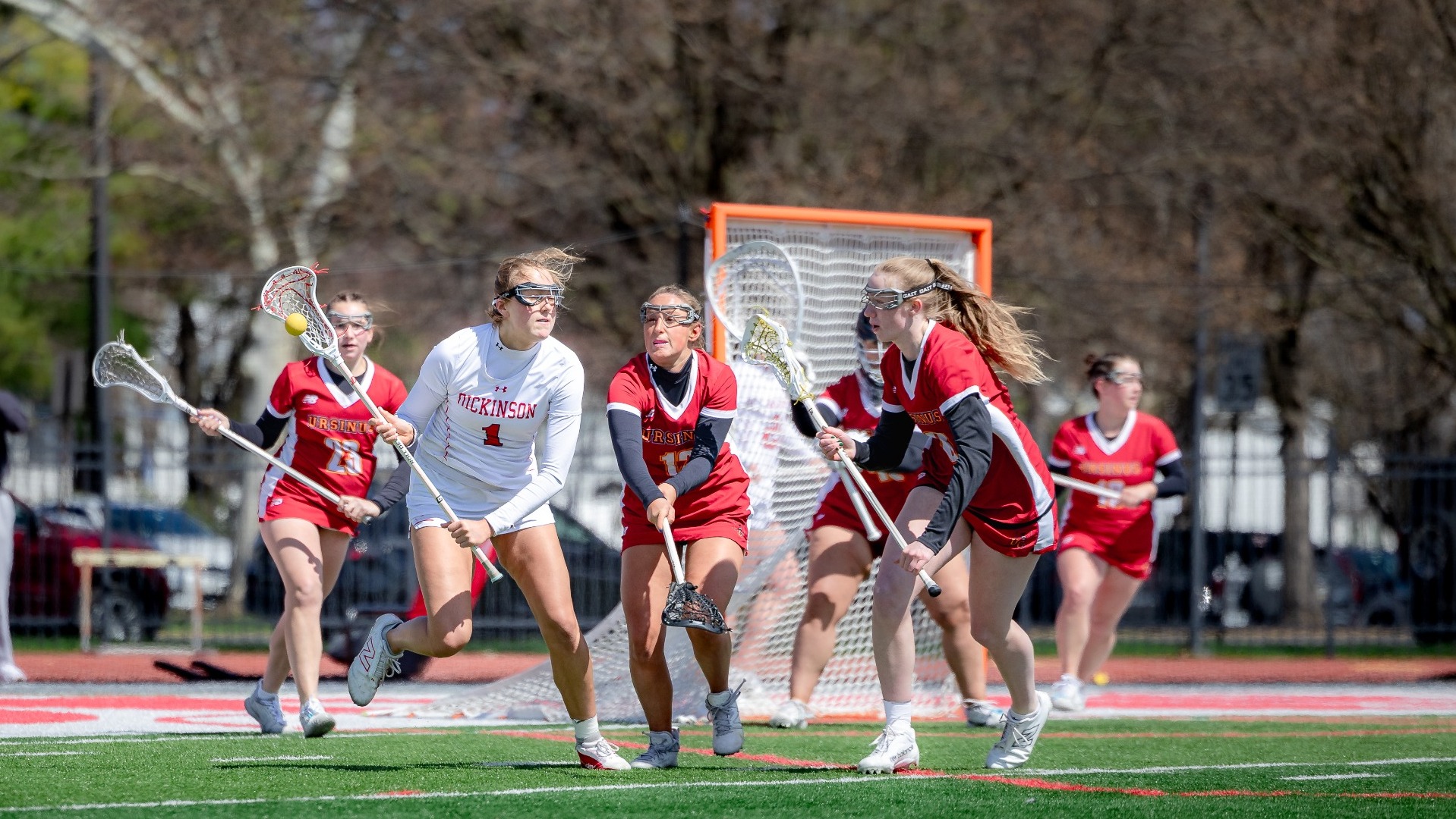 Eva Gardner working around the Ursinus College defense on Senior Day 3-28-26