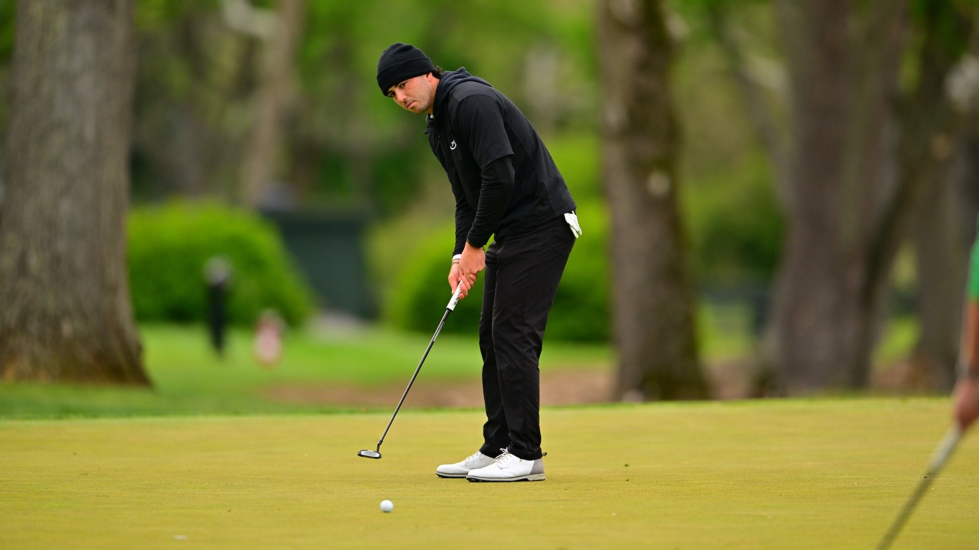 Collin McMahon-Shea attempting a putt on day three of the Centennial Conference Championship at Waynesboro Country Club 4-26-26