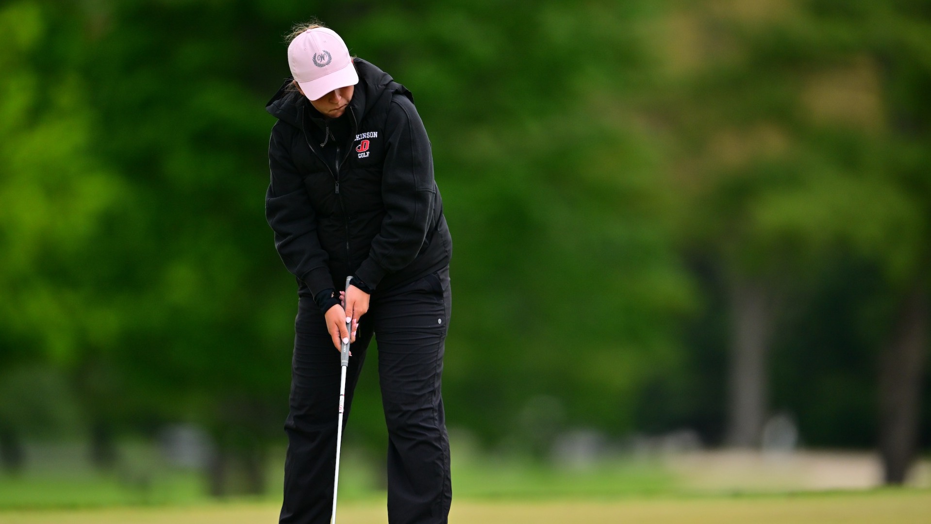 Women's golfer taking a put on day two of the Centennial Conference Championship at Waynesboro Country Club on 4-26-26