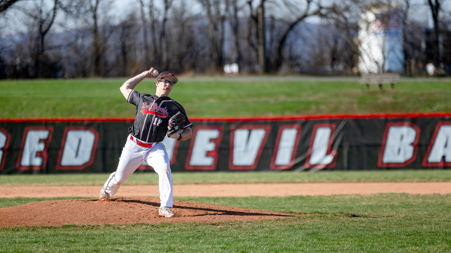 Aidan McElhatton getting ready to make a pitch against St. Lawrence University during the 2026 season