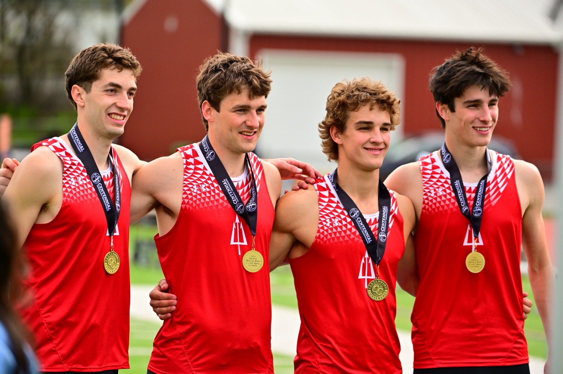 Gareau, Buroker, Dooley, and Richwine pose with their gold medals 