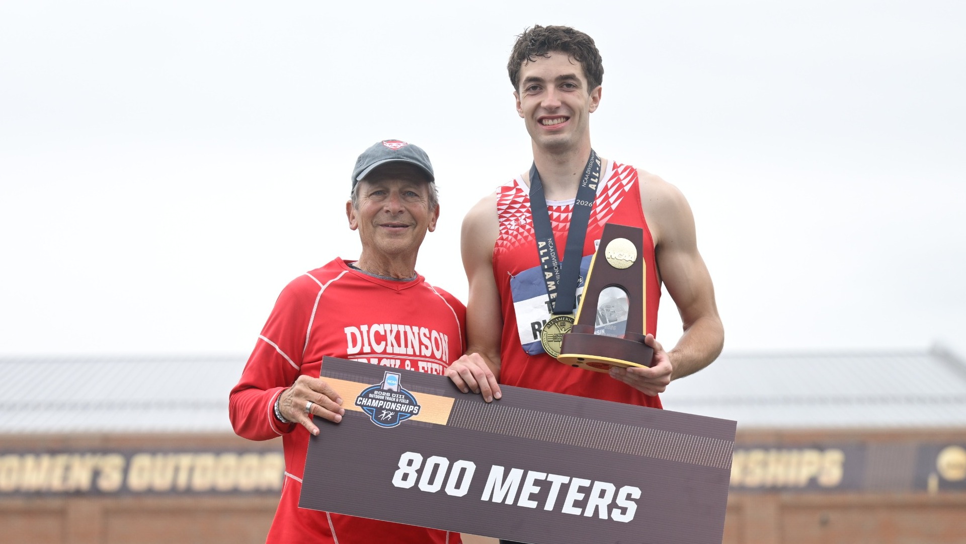 Trevor Richwine and Coach Don Nichter standing next to each other on the podium at the 2026 NCAA Outdoor Track & Field Championships