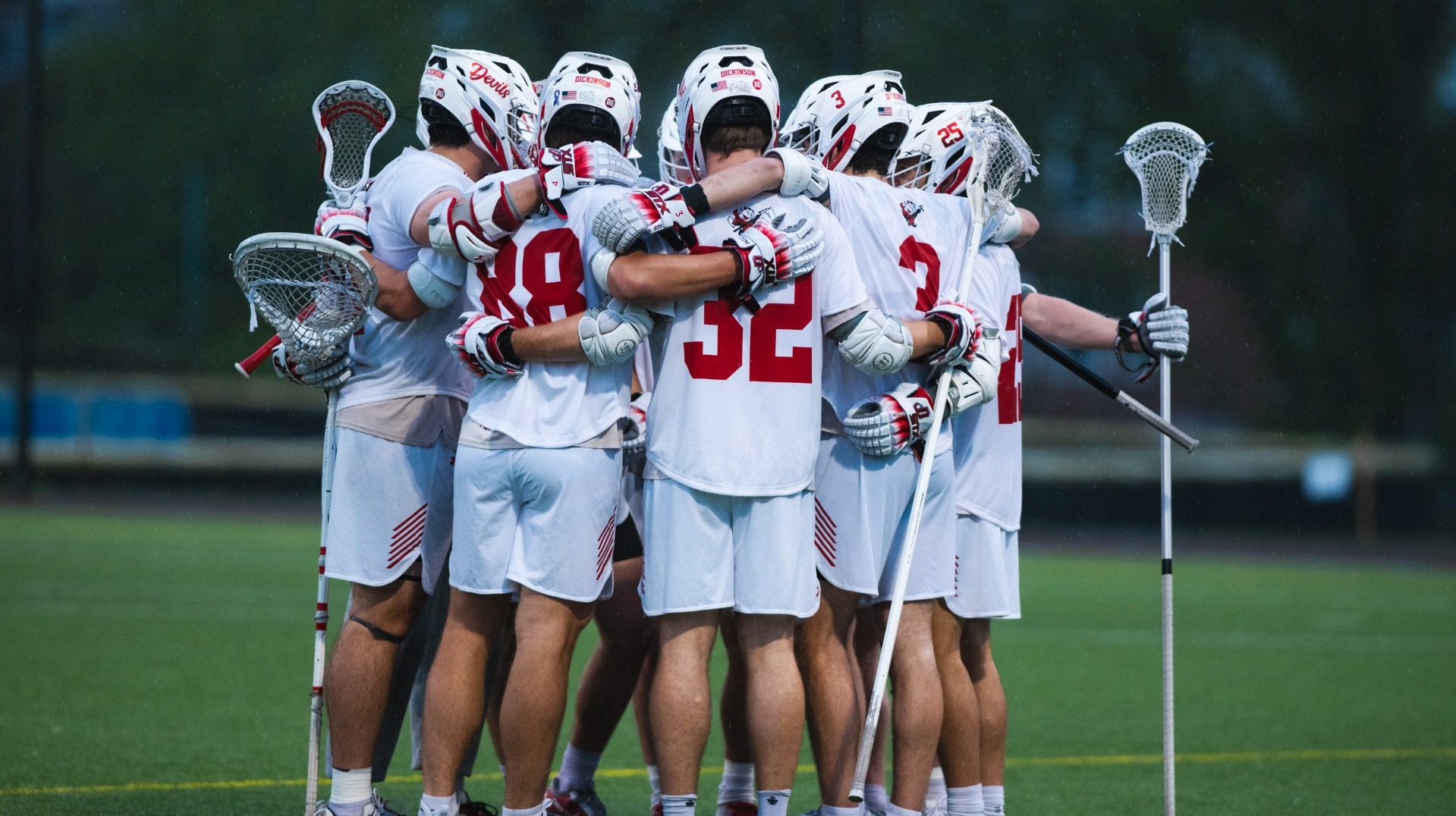 Dickinson men's lacrosse starting lineup huddle against Middlebury College on 5-9-26 