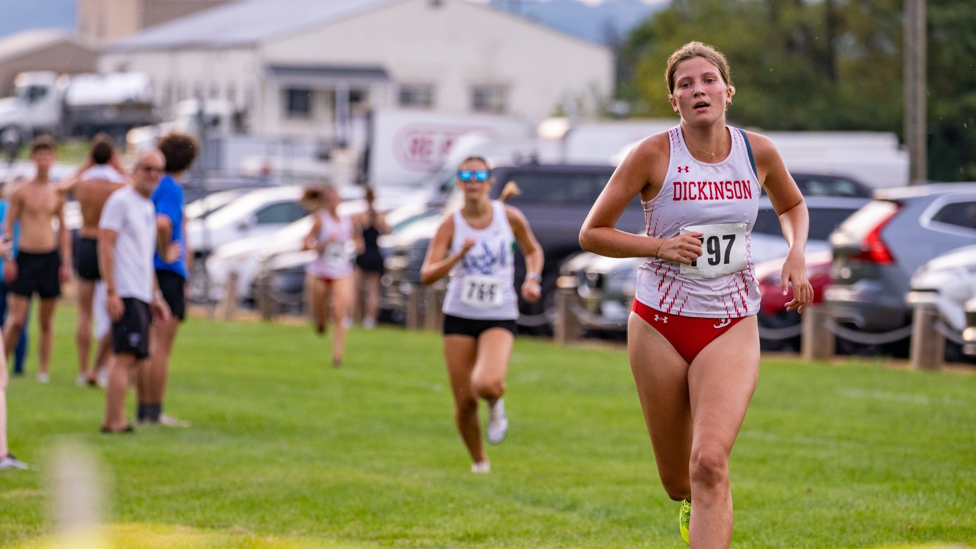 Liza Barbash crossing the finish line in fourth at The Little Three Championship on 9-1-26