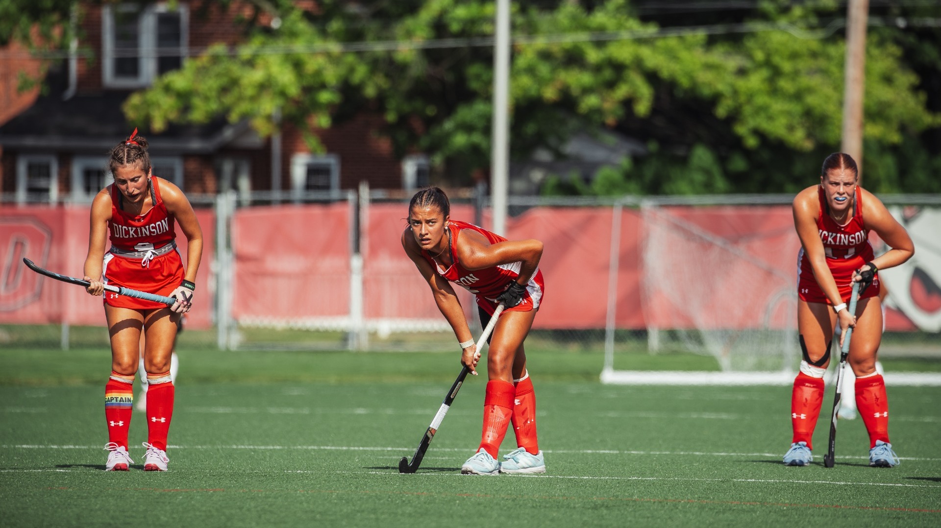 Three field hockey attackers lined up for a penalty corner against Susquehanna University on 9-9-26