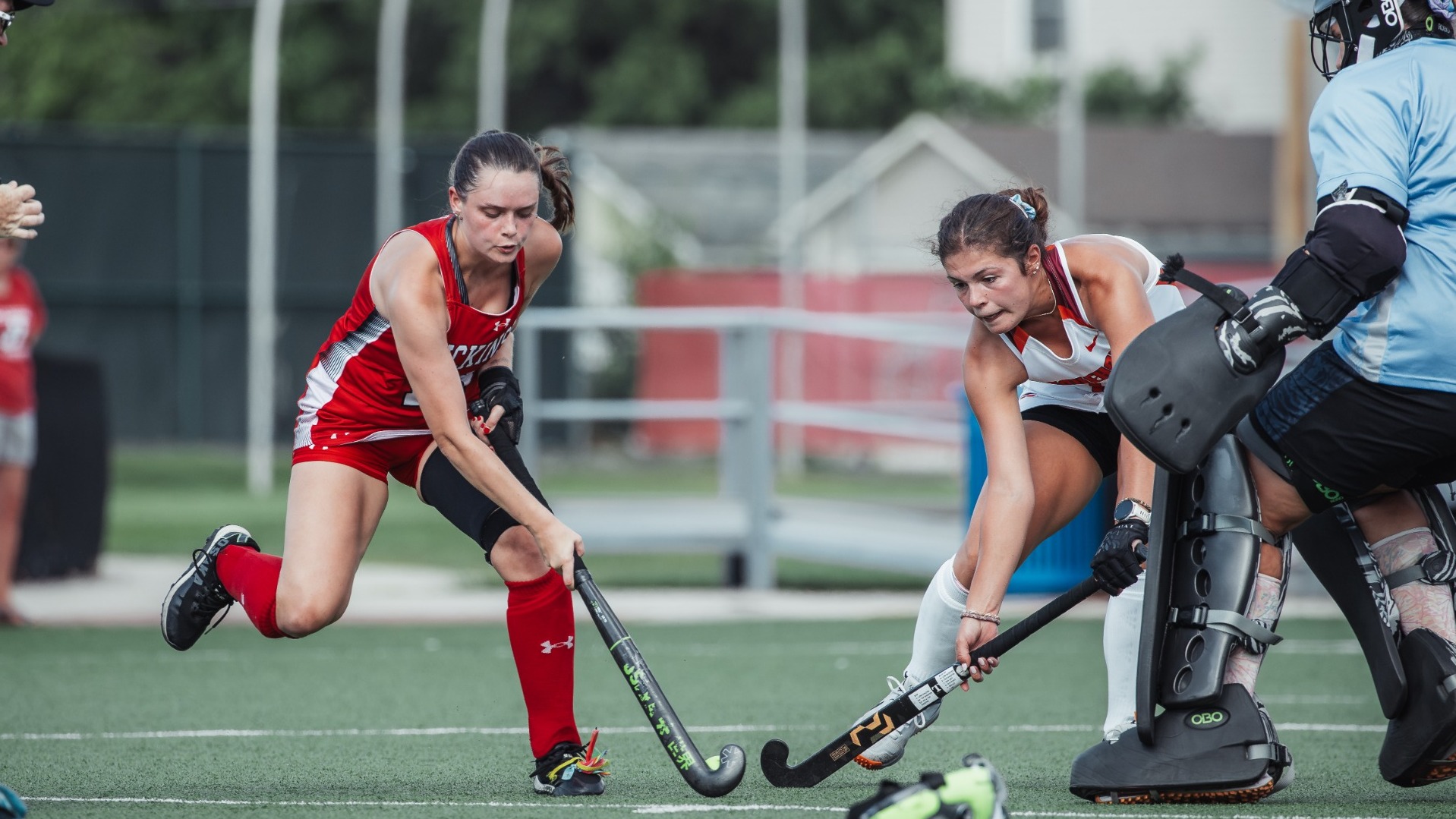 Megan McClure stretching for a ball against Susquehanna University on 9-9-26