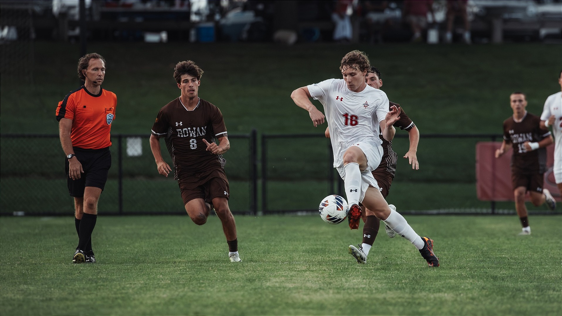 Josh Dozier bringing the ball forward against Rowan University on 9-4-26