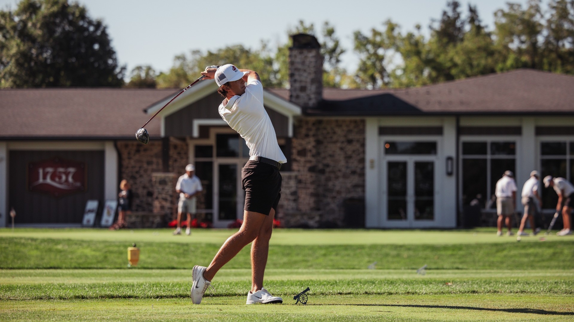 Walter Gumbinger completing a tee shot at the Dickinson College Fall Invite on 9-7-26