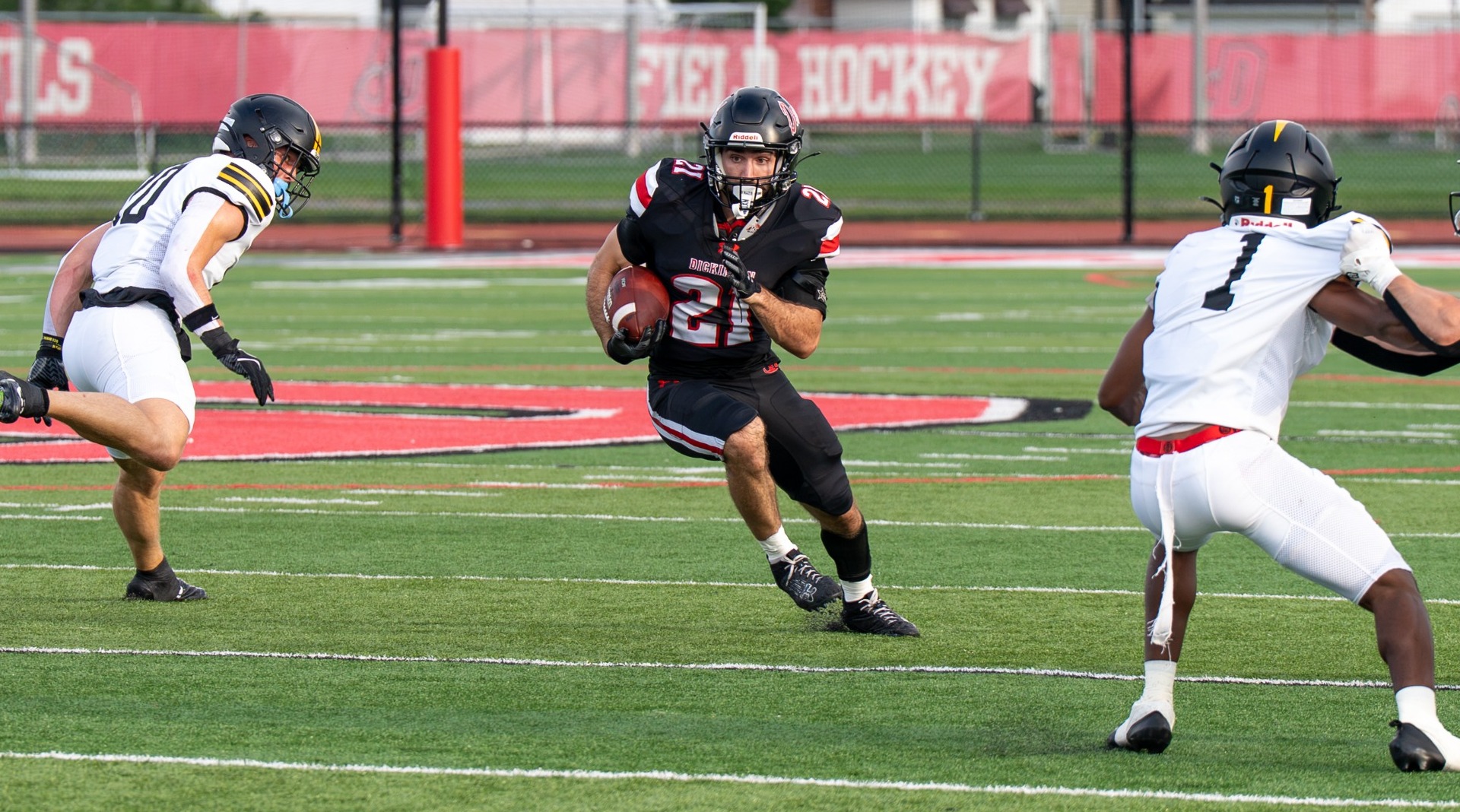 Jake Williams carrying the ball against Randolph-Macon College on 9-4-26