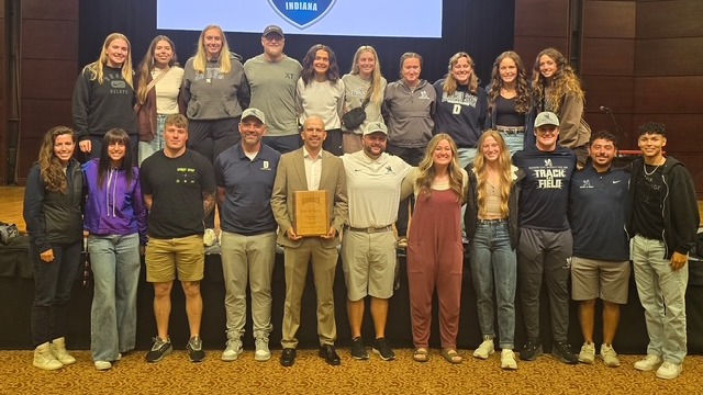 Allan Ayala with the DSU Track and Field National Team