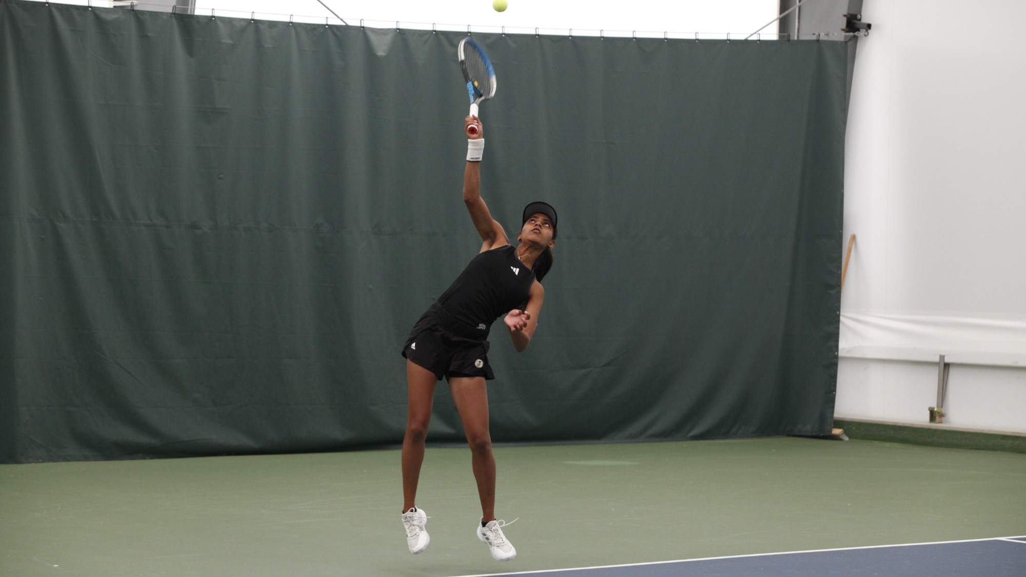 Deepa Vanaraja with the serve
