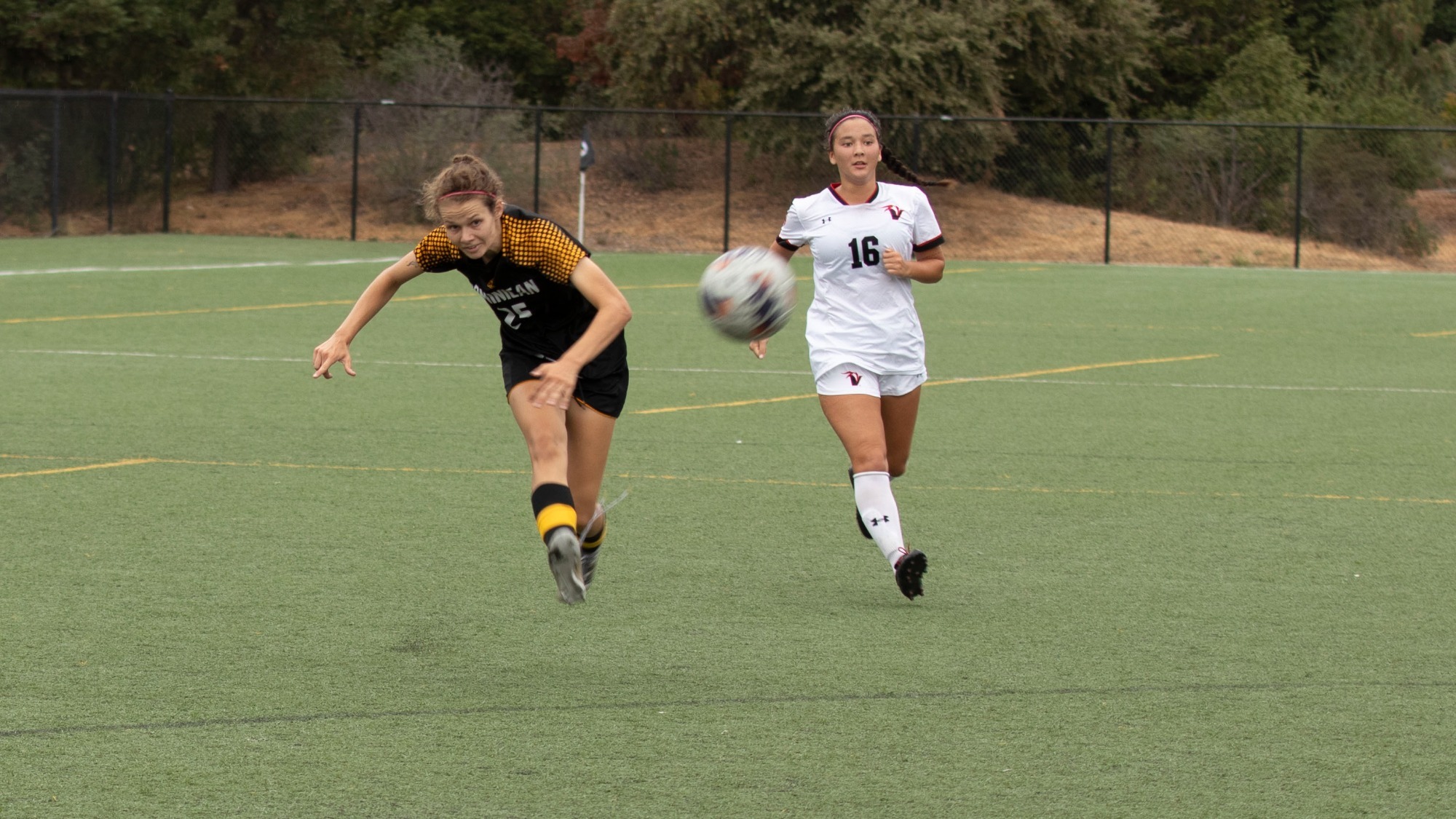 Megan Clapinski scores a long goal against UHH