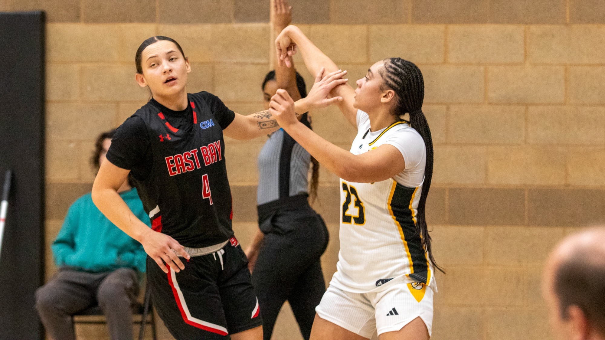 Aryn Bright holds her form as she makes a corner 3