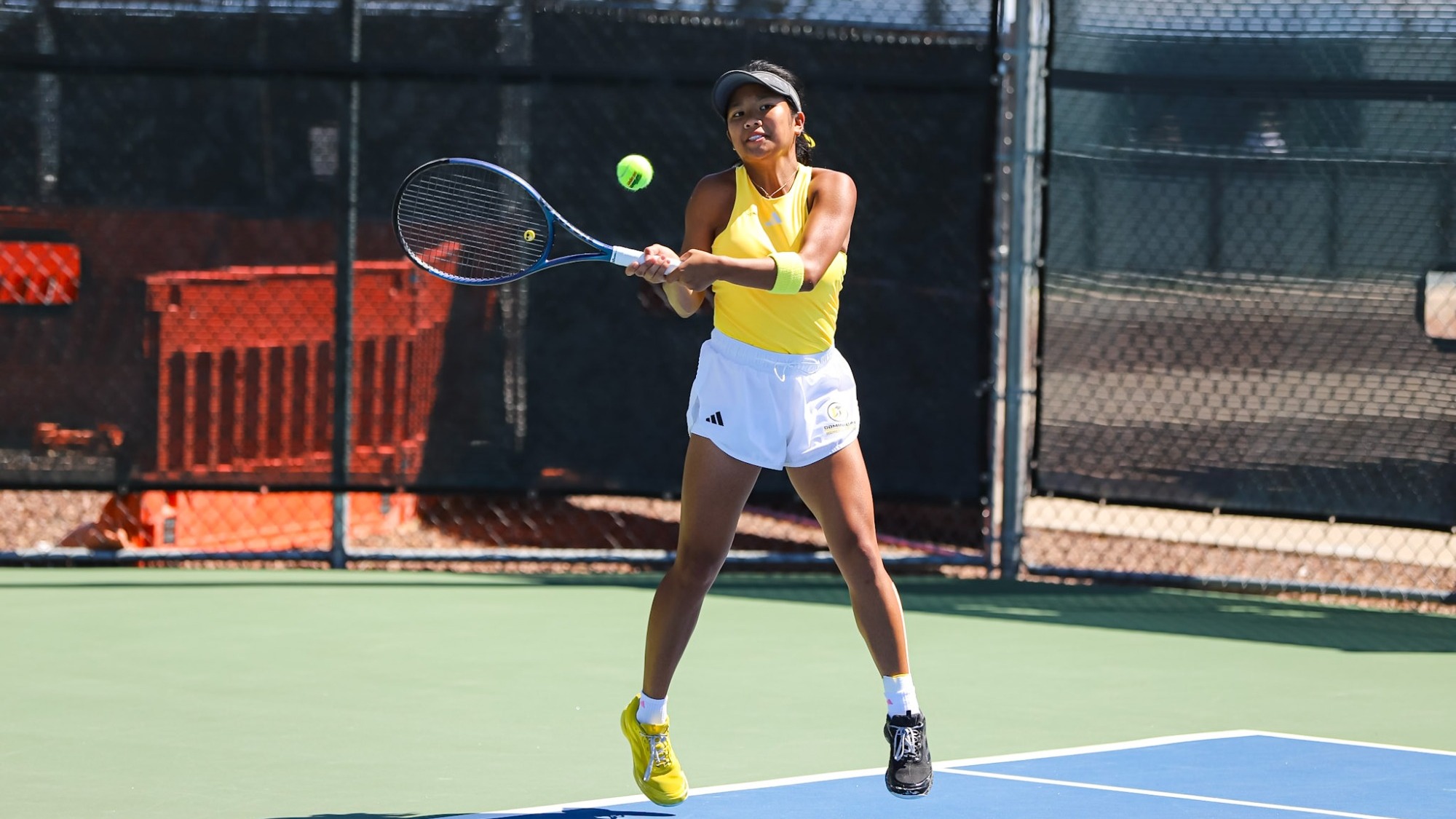 Audrey Rafols with a forehand return