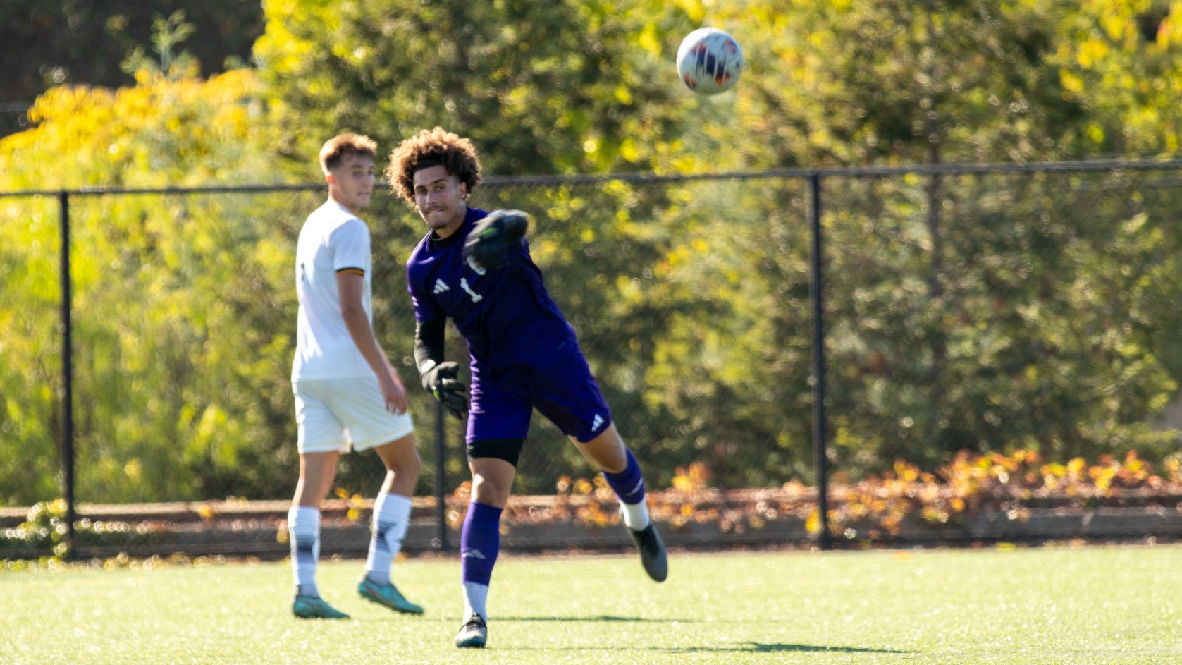 Colin Nestor throws a ball up field as he looks to start an attack