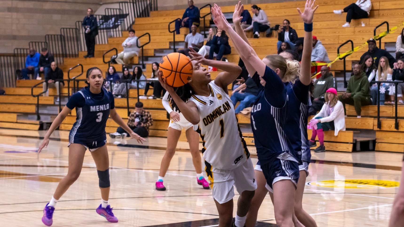 Mahliya Wilson finishes in traffic for the go-ahead basket in the fourth quarter